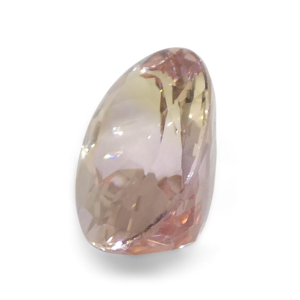 1.35 Carat Oval Orangy Pink Topaz GIA Certified For Sale 1