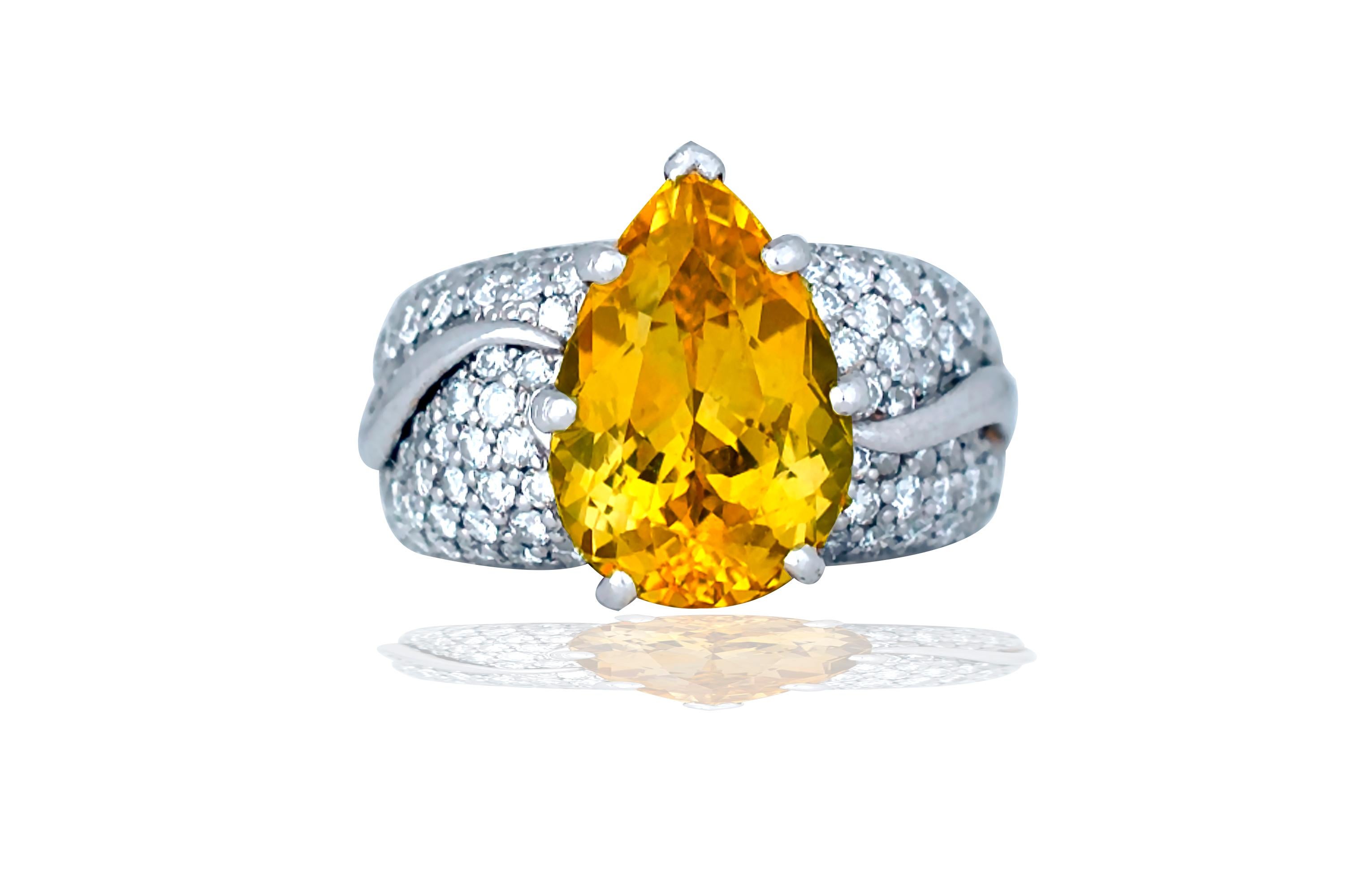 Modern 13.5 Carat Yellow Sapphire and Diamond 18 Karat Ring For Sale