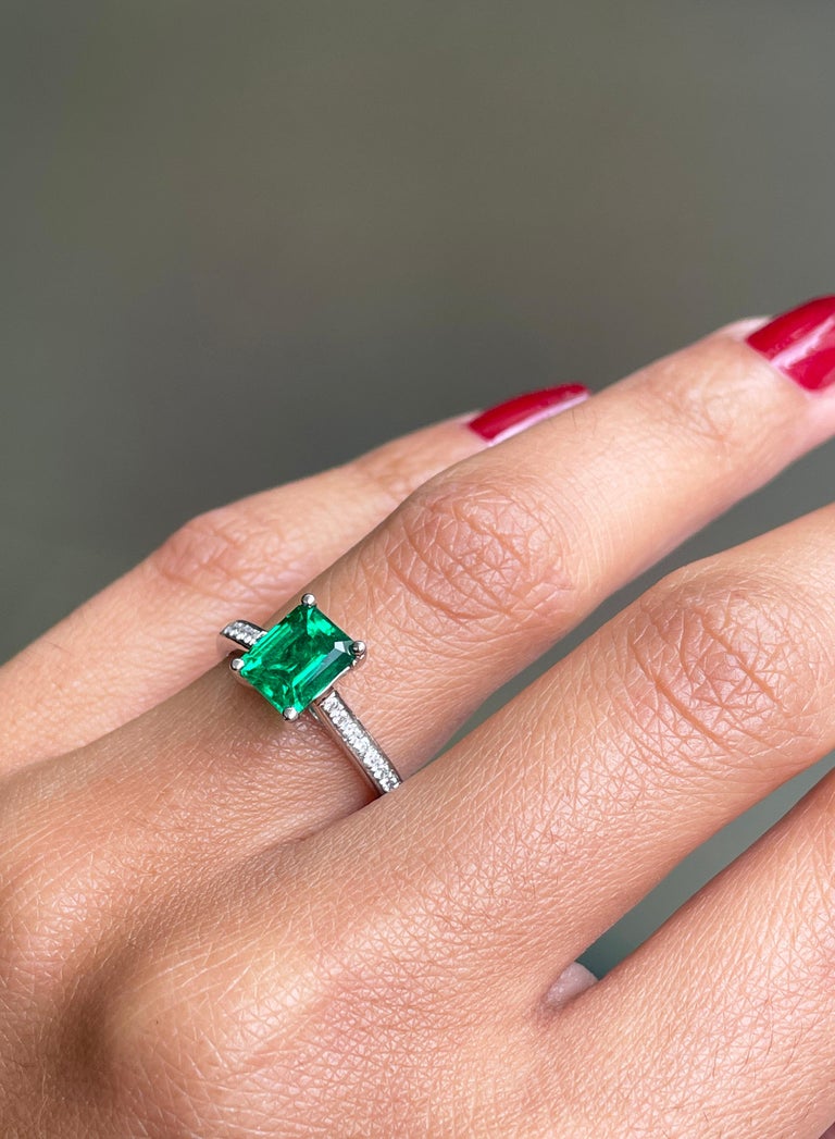 1.36 Carat Emerald Cut Emerald and Diamond Platinum Engagement Ring For Sale 1