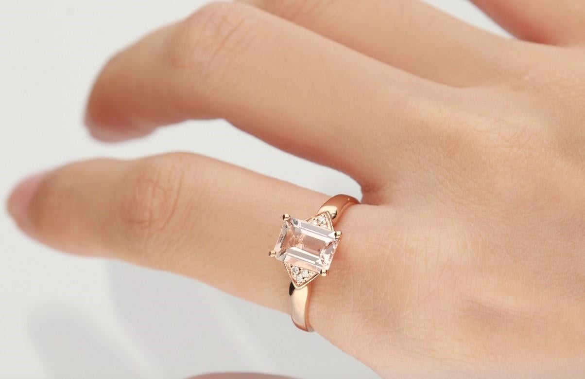 This beautiful Morganite ring is crafted in 14-karat Rose gold and features a 1.36 carat Genuine Morganite, 6 Round White Diamonds in GH- I1 quality with 0.04 ct  in a prong-setting. This ring comes in sizes 6 to 9, and it is a perfect gift either