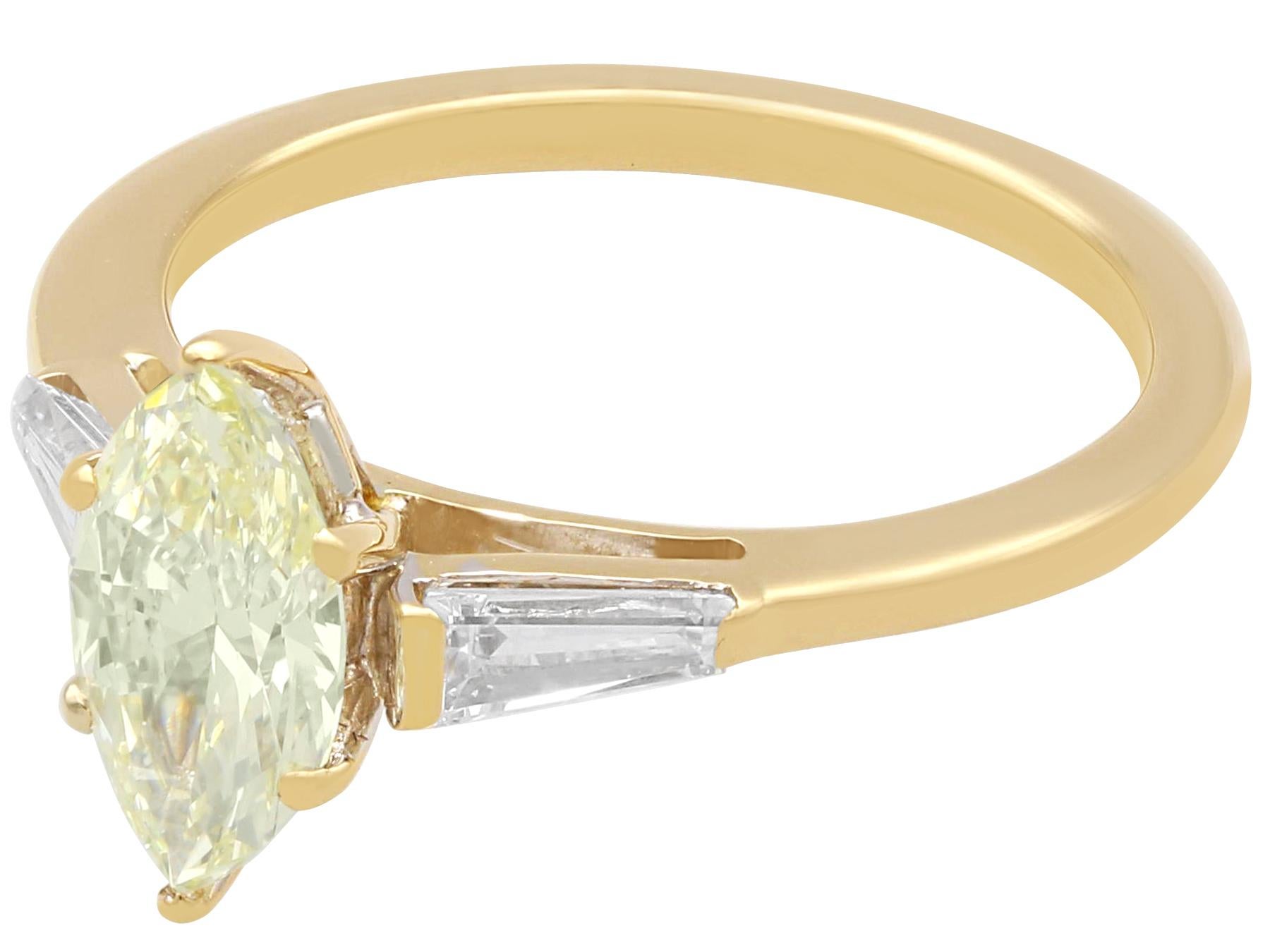 A stunning, fine and impressive GIA certified 1.36 carat light yellow marquise diamond and 18 karat yellow gold solitaire ring; part of our diverse range of diamond engagement rings.

This stunning contemporary engagement ring has been crafted in