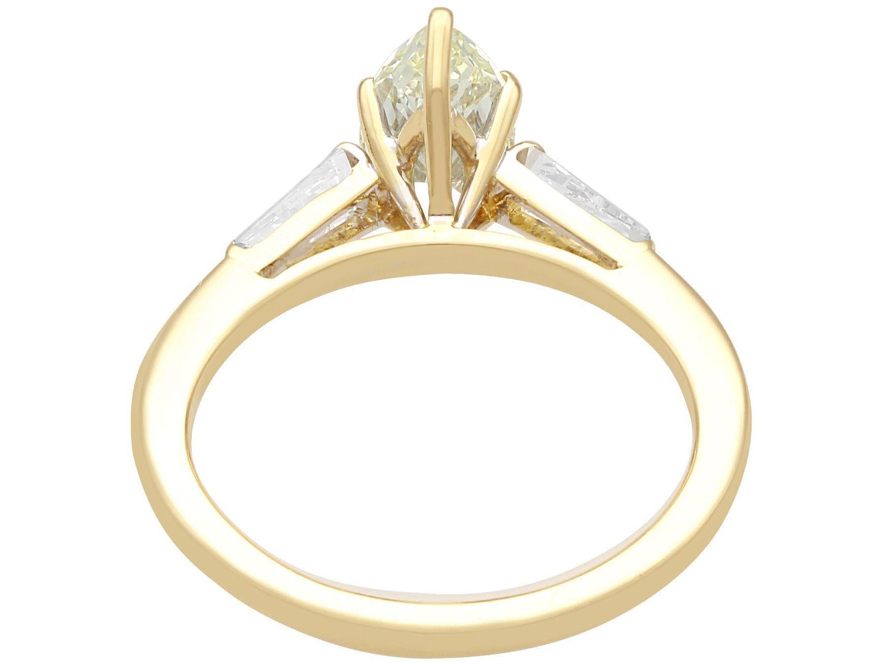 Marquise Cut GIA Certified 1.36 Carat Light Yellow Diamond and Yellow Gold Solitaire Ring For Sale