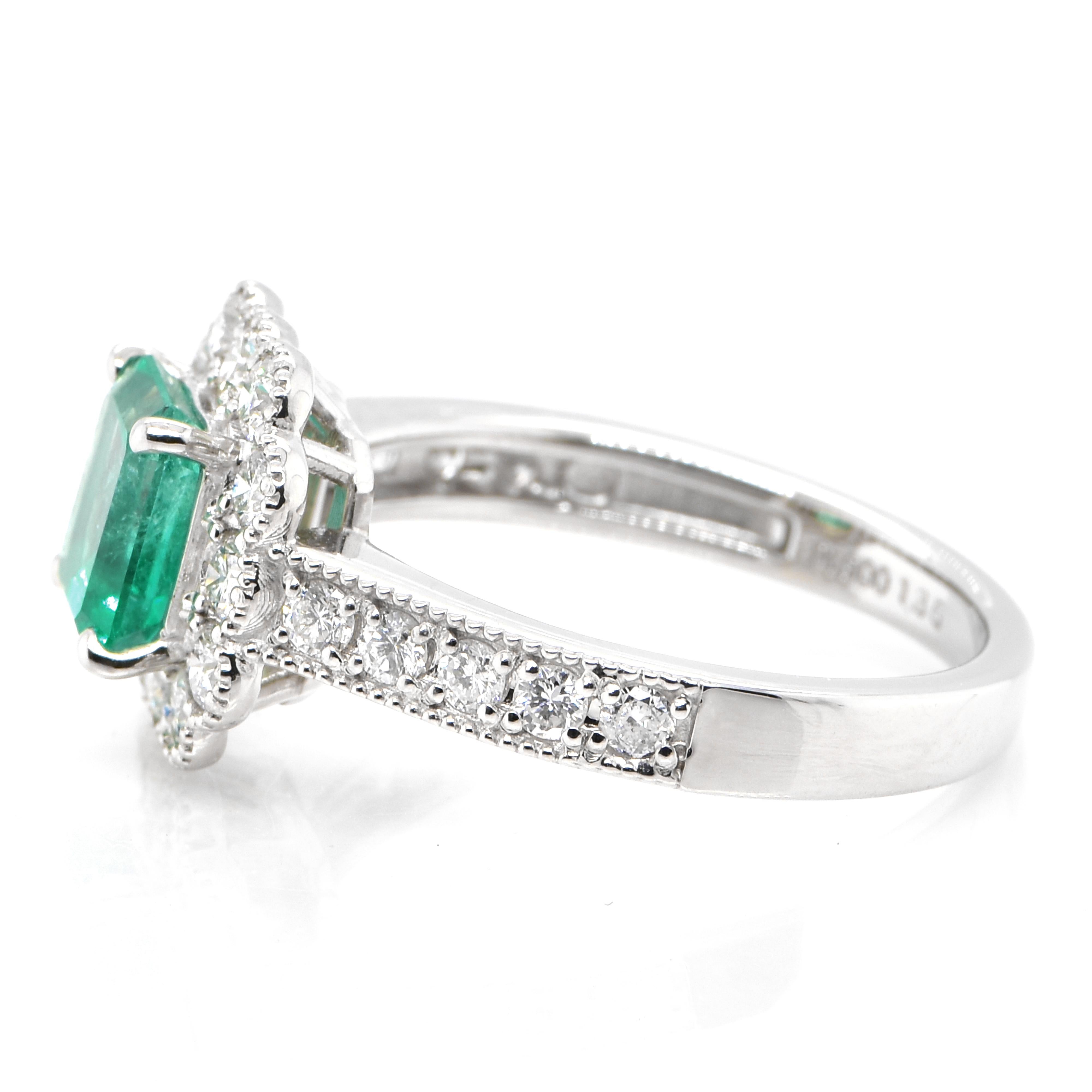Emerald Cut 1.36 Carat Natural Colombian Emerald and Diamond Halo Ring set in Platinum For Sale