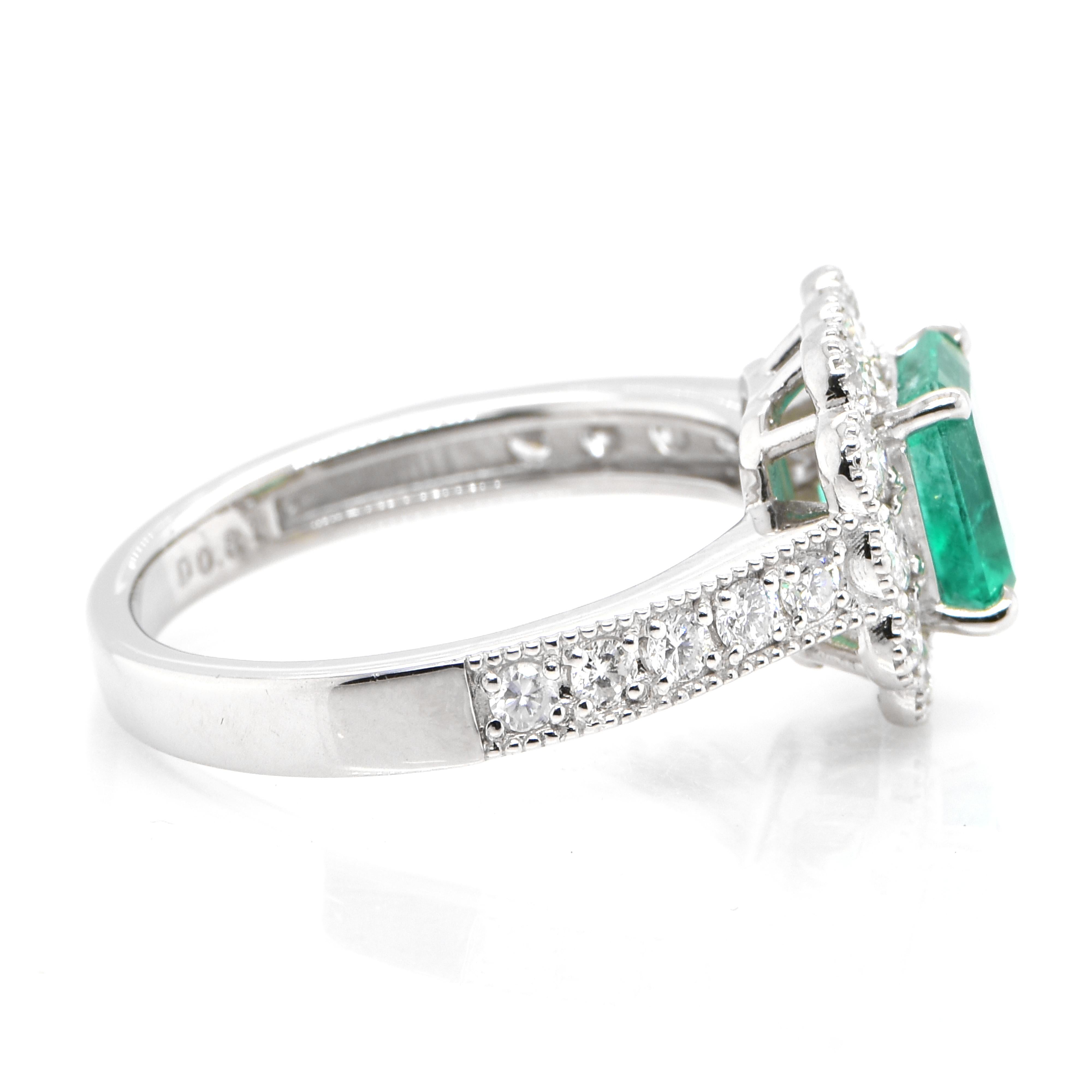 1.36 Carat Natural Colombian Emerald and Diamond Halo Ring set in Platinum In New Condition For Sale In Tokyo, JP