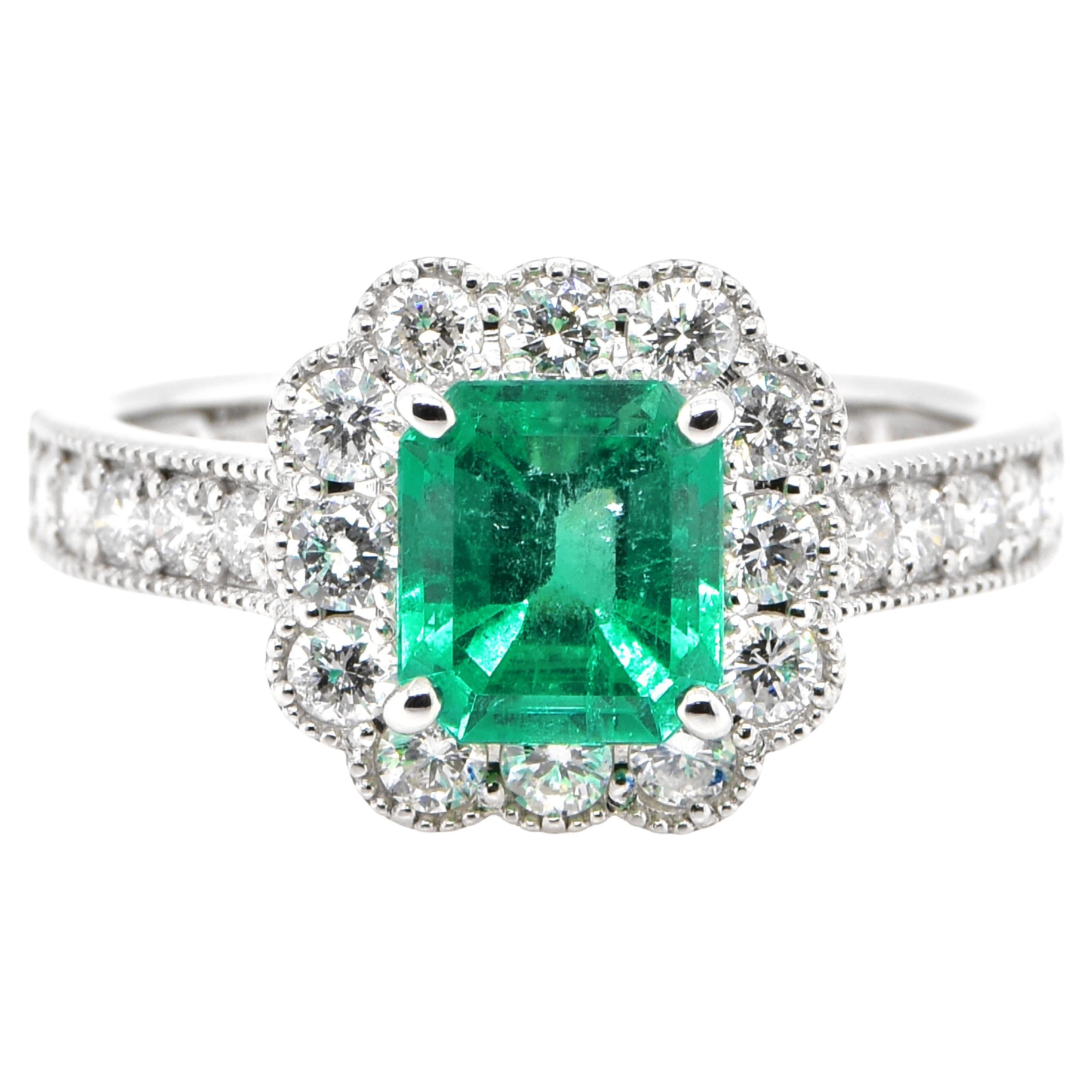 1.36 Carat Natural Colombian Emerald and Diamond Halo Ring set in Platinum For Sale