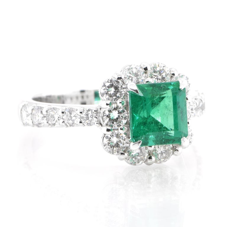 Modern 1.36 Carat Natural Colombian, Vivid Green Emerald Halo Ring Set in Platinum For Sale