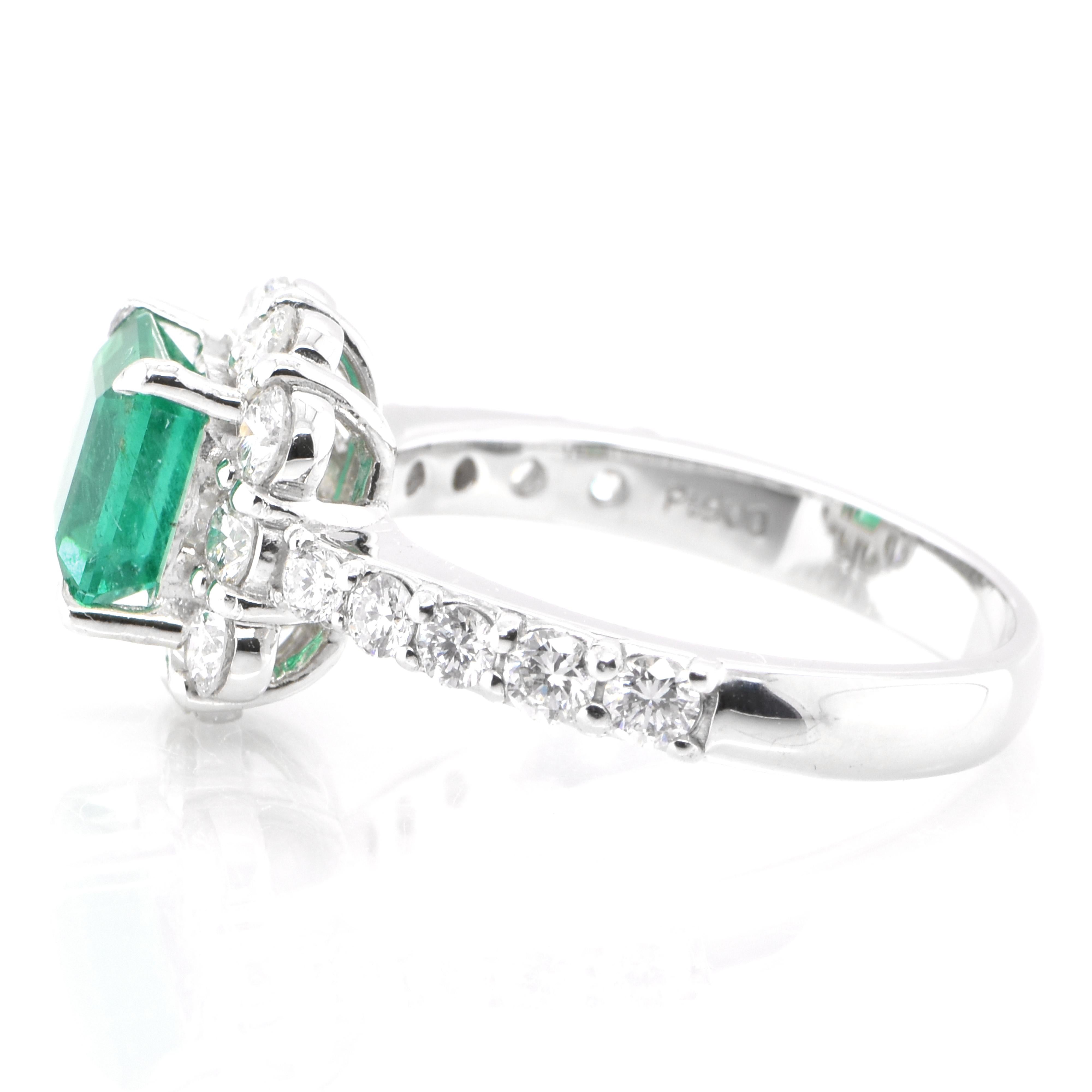 Emerald Cut 1.36 Carat Natural Colombian, Vivid Green Emerald Halo Ring Set in Platinum