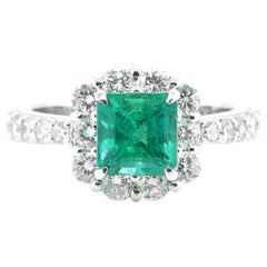 1.36 Carat Natural Colombian, Vivid Green Emerald Halo Ring Set in Platinum