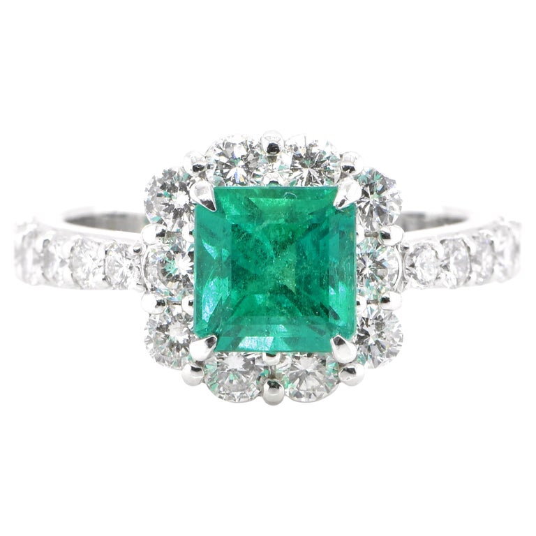 1.36 Carat Natural Colombian, Vivid Green Emerald Halo Ring Set in Platinum For Sale