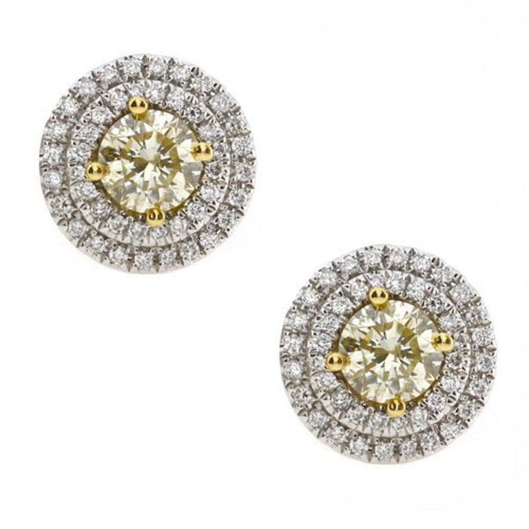 Art Deco 1.02 Carat Natural Fancy Yellow Diamond Stud Earrings with Double Halo For Sale