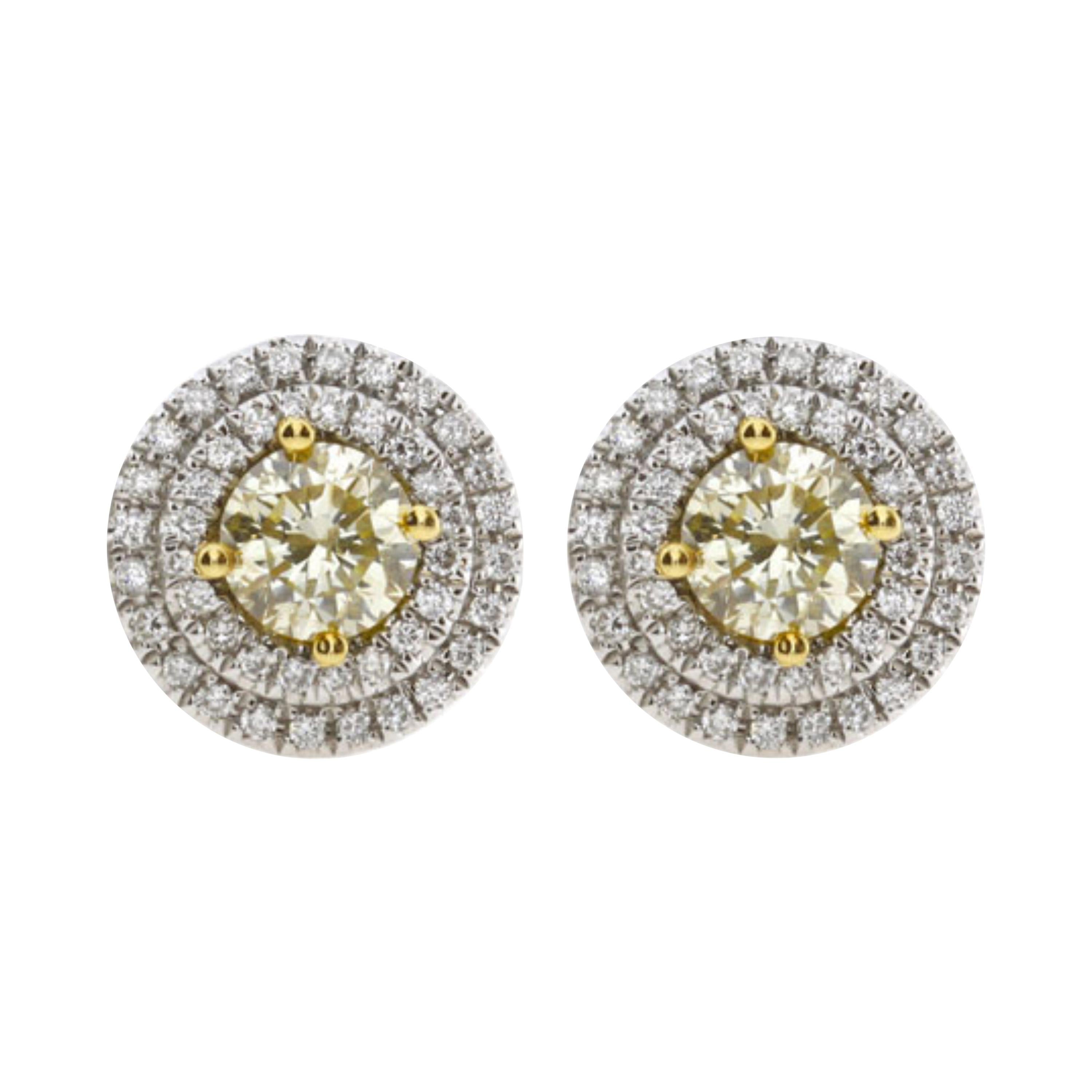 1.02 Carat Natural Fancy Yellow Diamond Stud Earrings with Double Halo For Sale