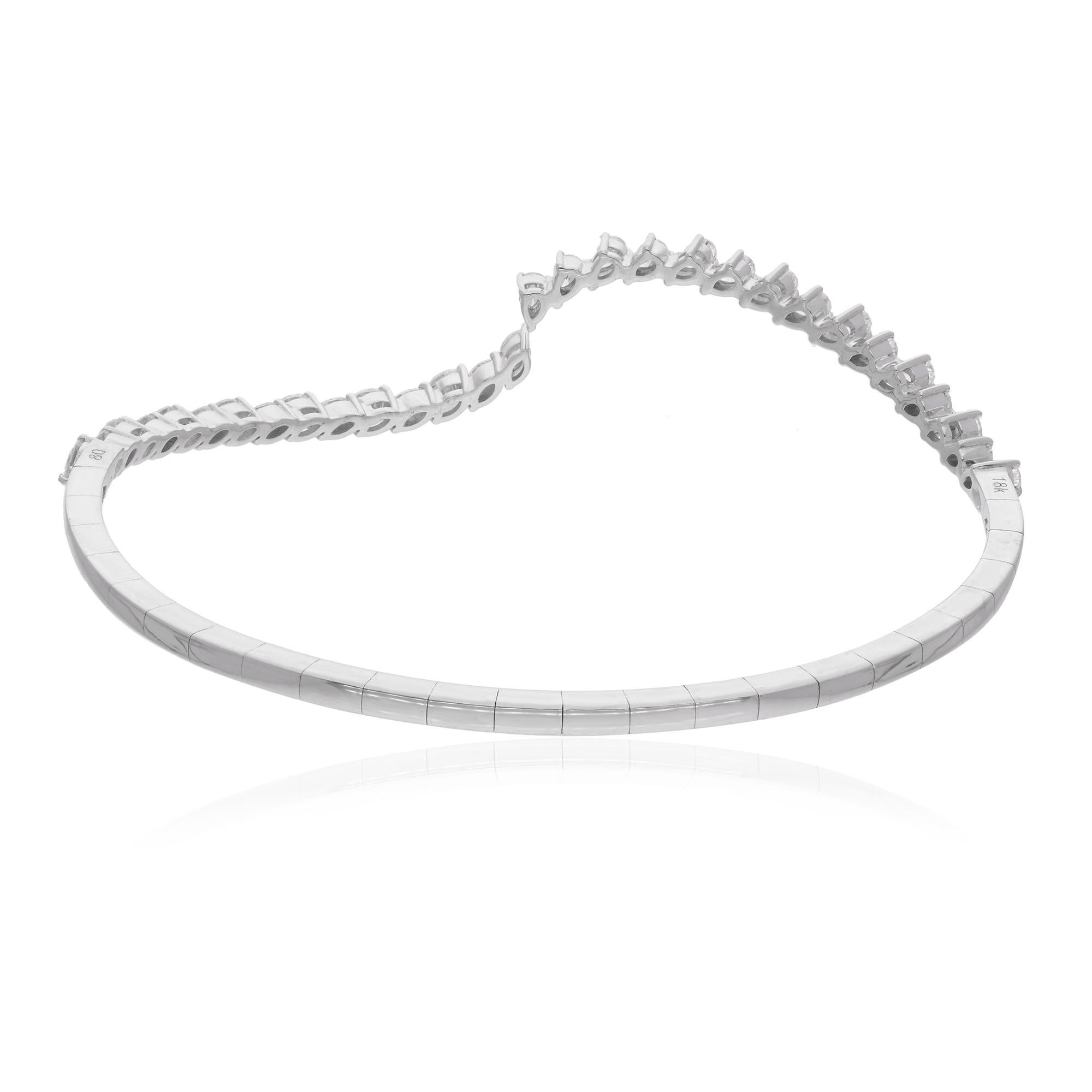 Add a touch of luxury to your jewelry collection with this exquisite Gold Diamond Bangle Bracelet. Crafted from 18k solid gold, this bracelet features a sleek and elegant design, with a band of shimmering diamonds carefully set to catch the light