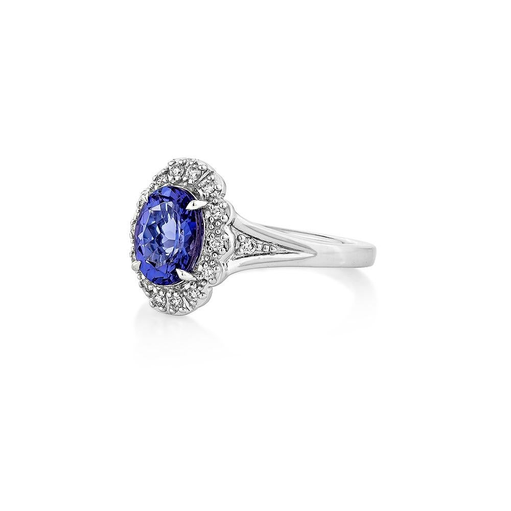 Oval Cut 1.36 Carat Tanzanite Fancy Ring in 18Karat White Gold with White  Diamond. For Sale