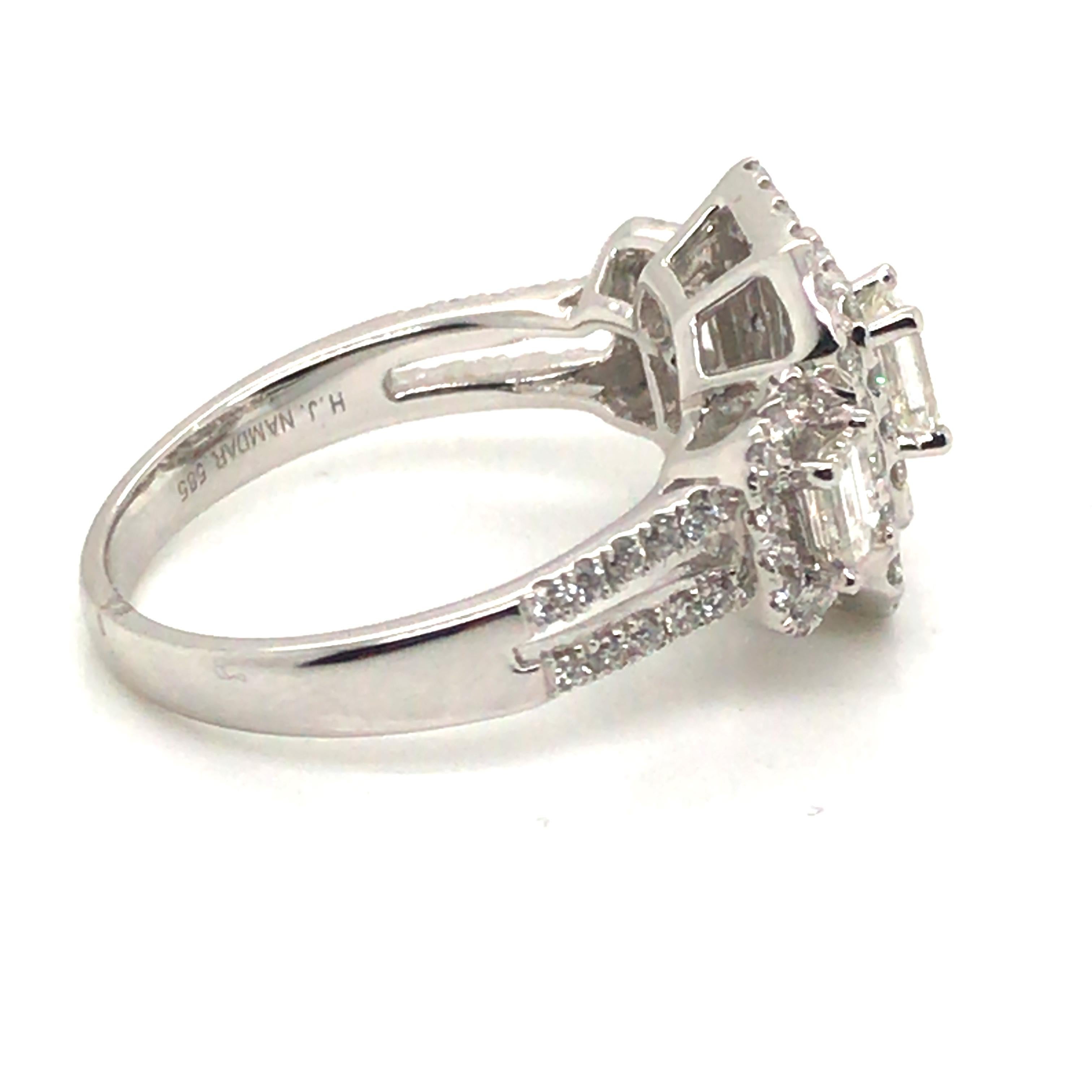 Check out our new 1.36 CT Cluster Style Round & Baguette Diamond Ring with 14 Karat White Gold
Round-Cut Diamond Weight: 0.74 Carats
Emerald-Cut Diamond Weight: 0.28 Carats
Baguette-Cut Diamond Weight: 0.34 Carats

Clarity Grade: SI1
Color Grade: