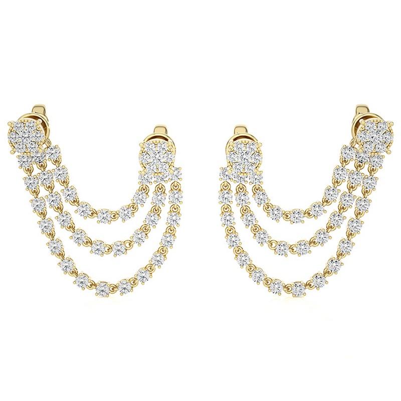 Vue d'ensemble :
Les boucles d'oreilles pendantes à triple rangée de diamants ronds de la Collection Gazebo sont une paire saisissante réalisée en or jaune 18 carats. Dotées d'un poids total de diamants impressionnant de 1.36 carats, ces boucles