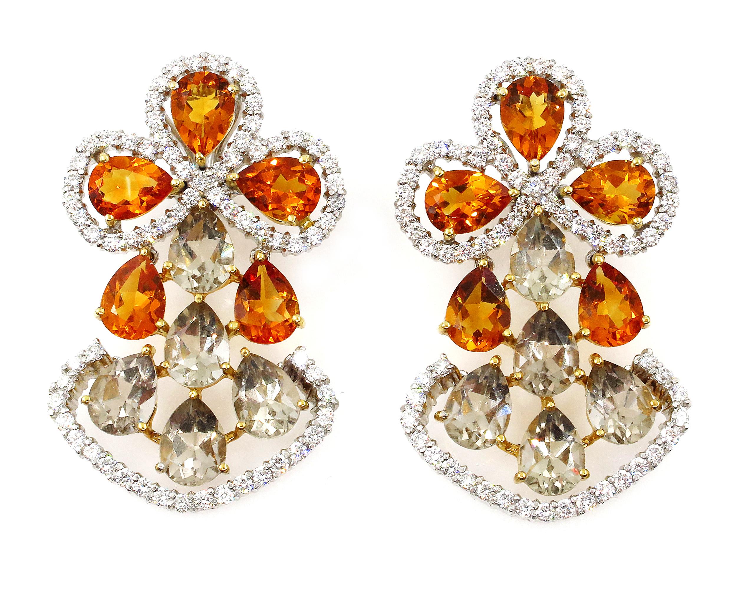 Brighten up your life and your lobes with these spectacular, and exceptionally beautiful, GORGEOUS, Absolutely Stunning Celebrity Red Carpet Style Earrings!
A pair of 18K White and Yellow Gold Diamond earrings with ROUND cut Diamonds.
The weight of