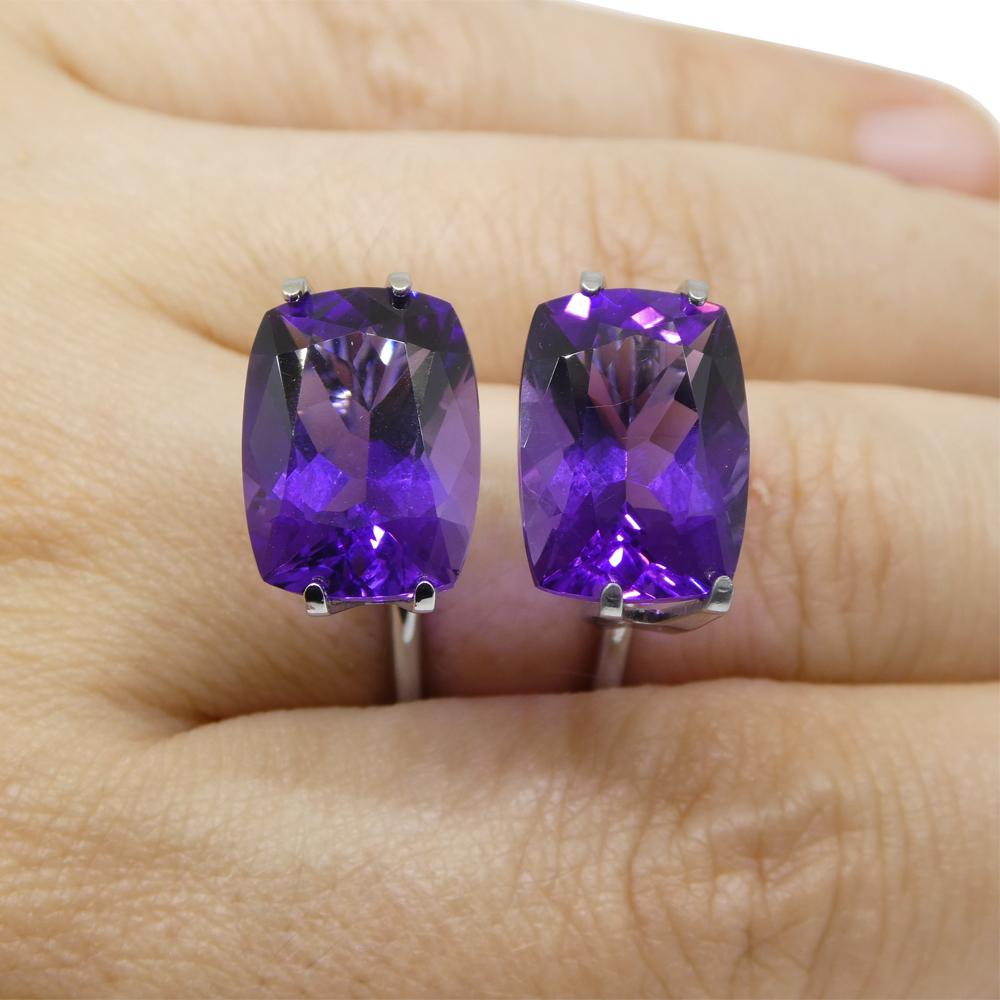 Description:

Gem Type: Amethyst
Number of Stones: 2
Weight: 13.62 cts (6.72ct / 6.90 ct)
Measurements: 14.41 x 10.65 x 7.38 mm / 14.43 x 10.39 x 7.52 mm
Shape: Cushion
Cutting Style:
Cutting Style Crown: Brilliant Cut
Cutting Style Pavilion: