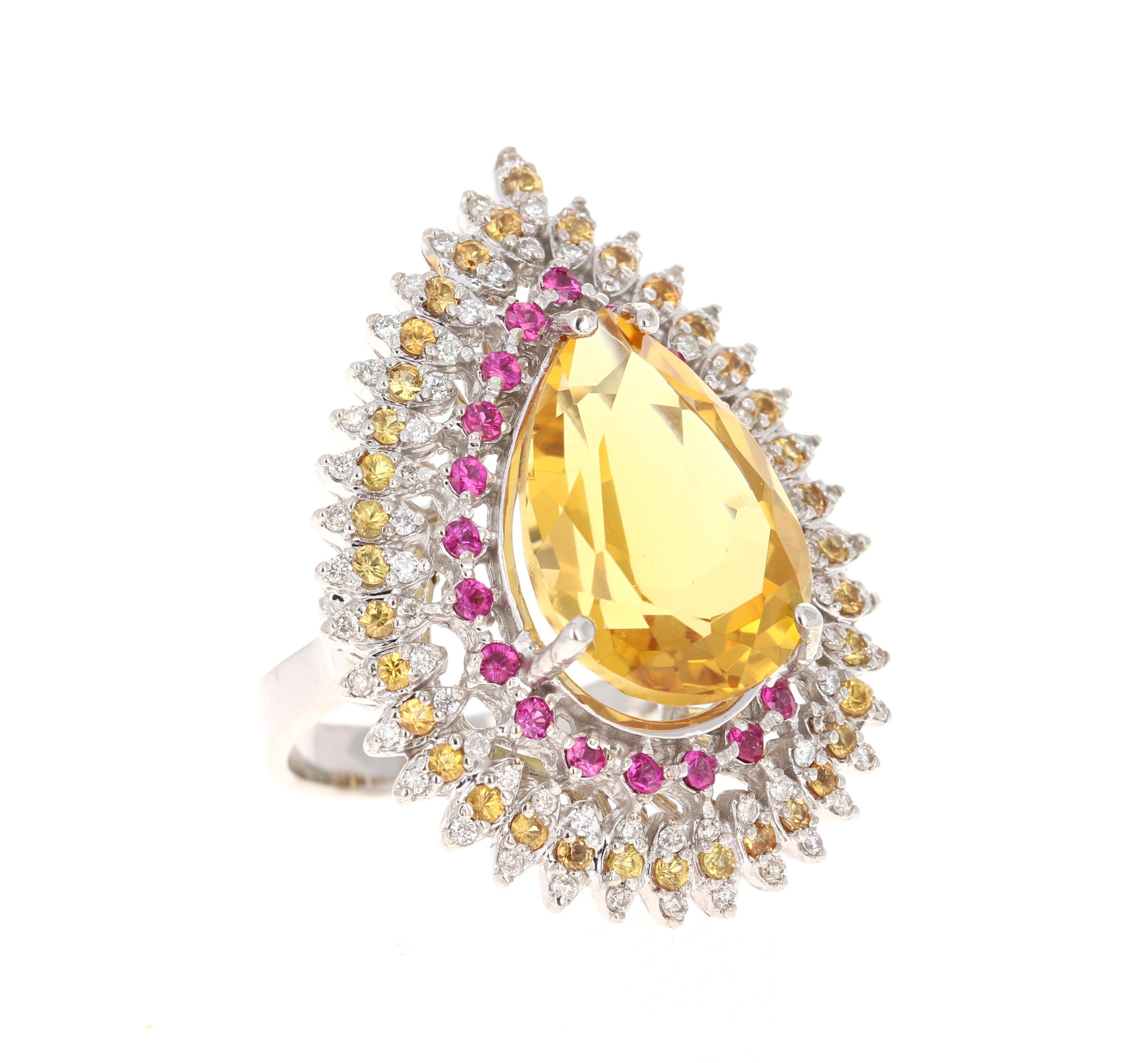 This ring has a natural Pear Cut Citrine that weighs 11.42 carats. The Citrine measures at 19 mm x 14 mm and has a beautiful golden yellow hue. The pink sapphires that adorn the ring weigh 0.84 carats and the yellow sapphires weigh 0.86 carats.