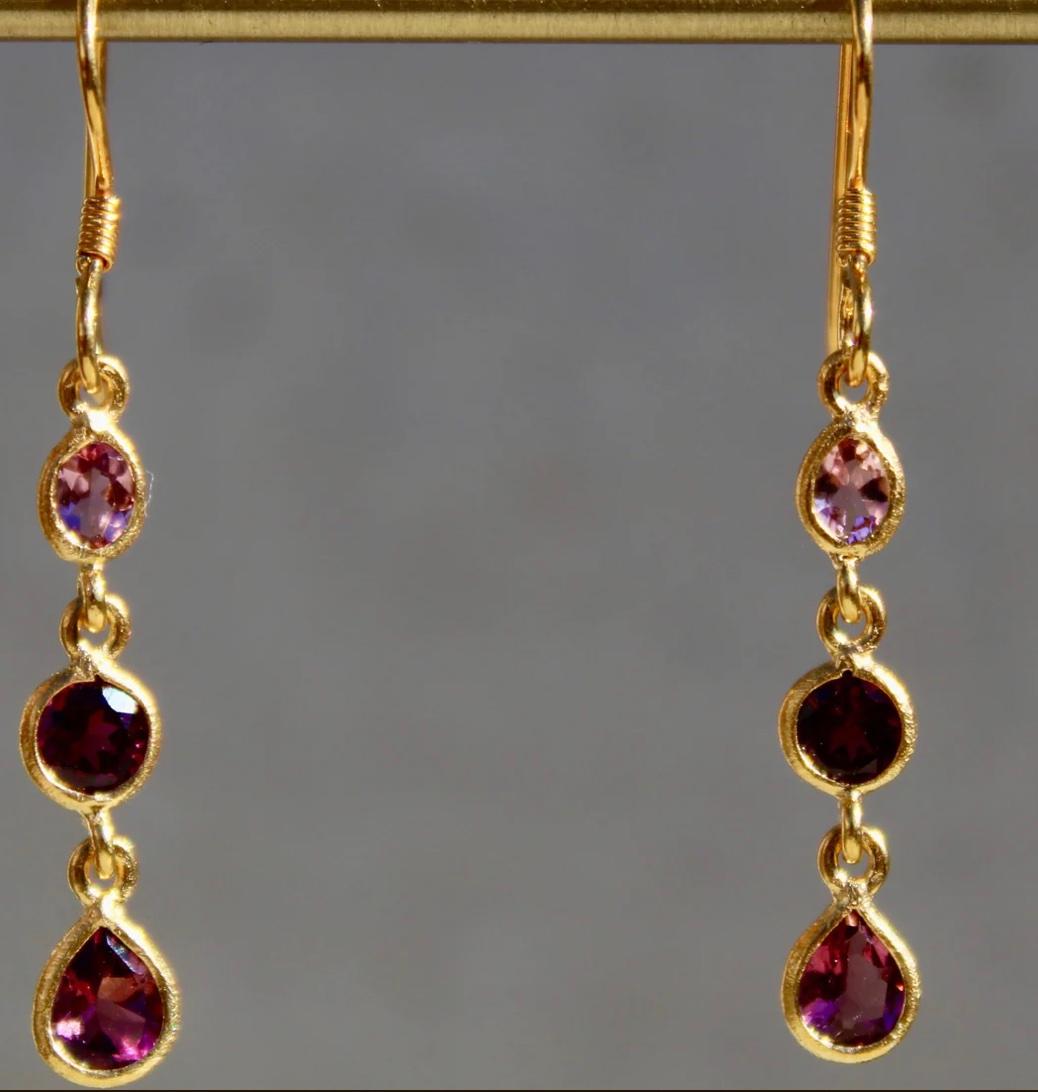 1.37 Total Carat

14K Gold French Wire

Pink Tourmaline Pear

Rhodolite Round

Pink Tourmaline Pear

Drop Length: 3cm