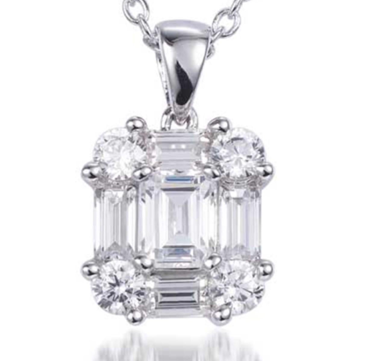 This enchanting pendant features a captivating emerald cut cubic zirconia at its centre, is flanked on all sides by four mini baguette cuts and has four round brilliant cuts set into the corners. 1.37ct total.

Encapsulated in 925 sterling silver