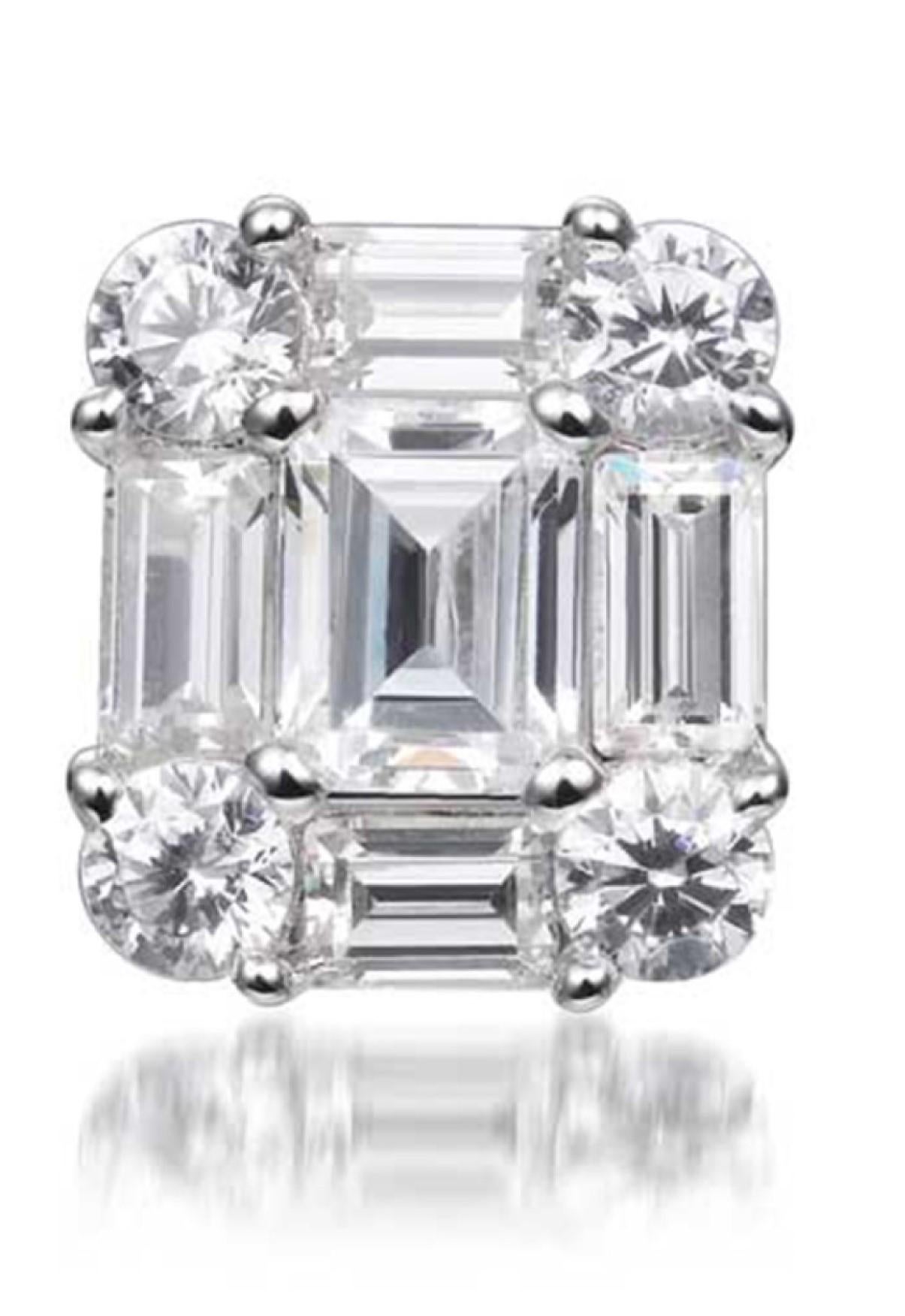 Part of our Diana collection, these enchanting stud earrings feature a captivating emerald cut cubic zirconia at the centre, is flanked on all sides by four mini baguette cuts and has four round brilliant cuts set into the corners, encapsulated in