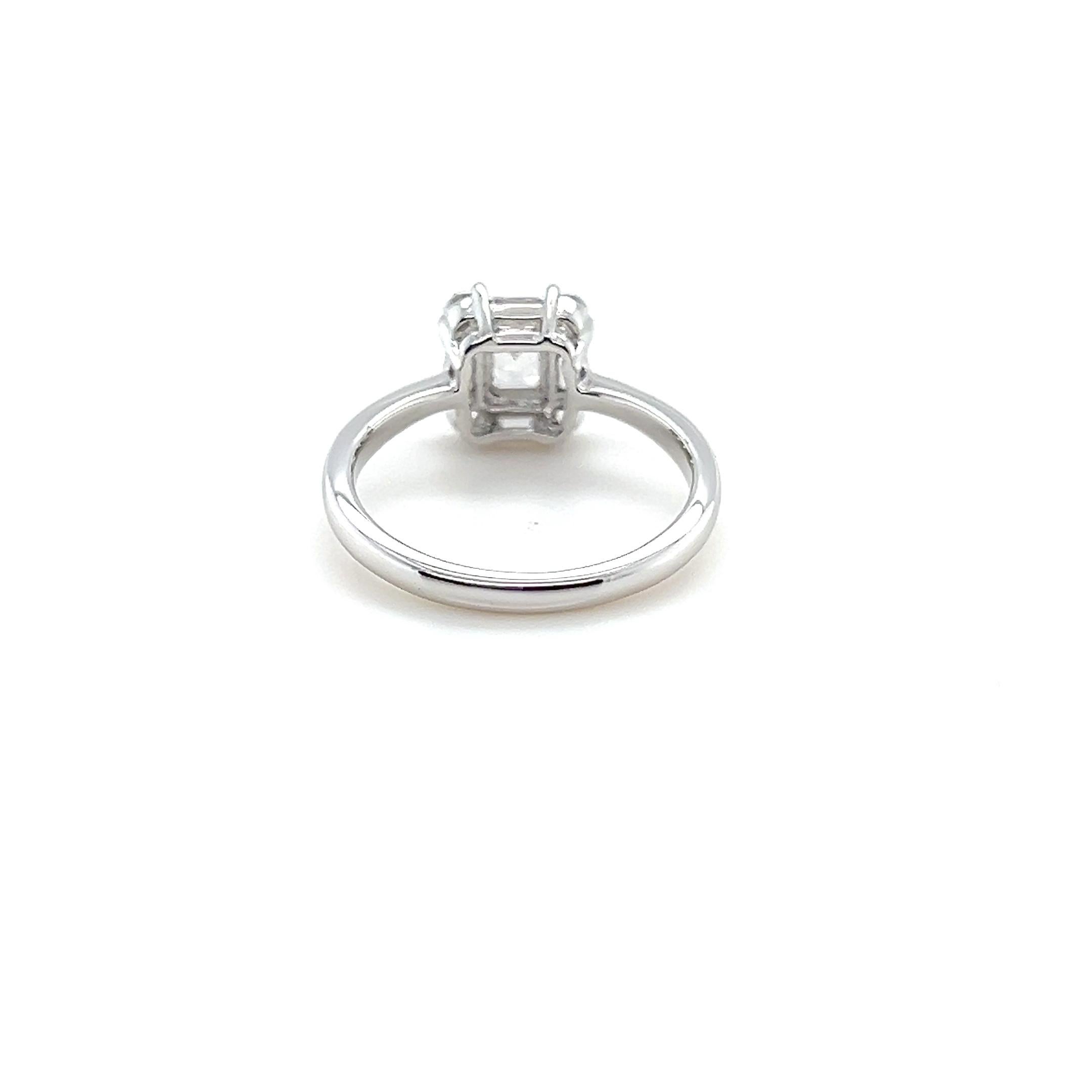 emerald cut cubic zirconia ring with baguettes