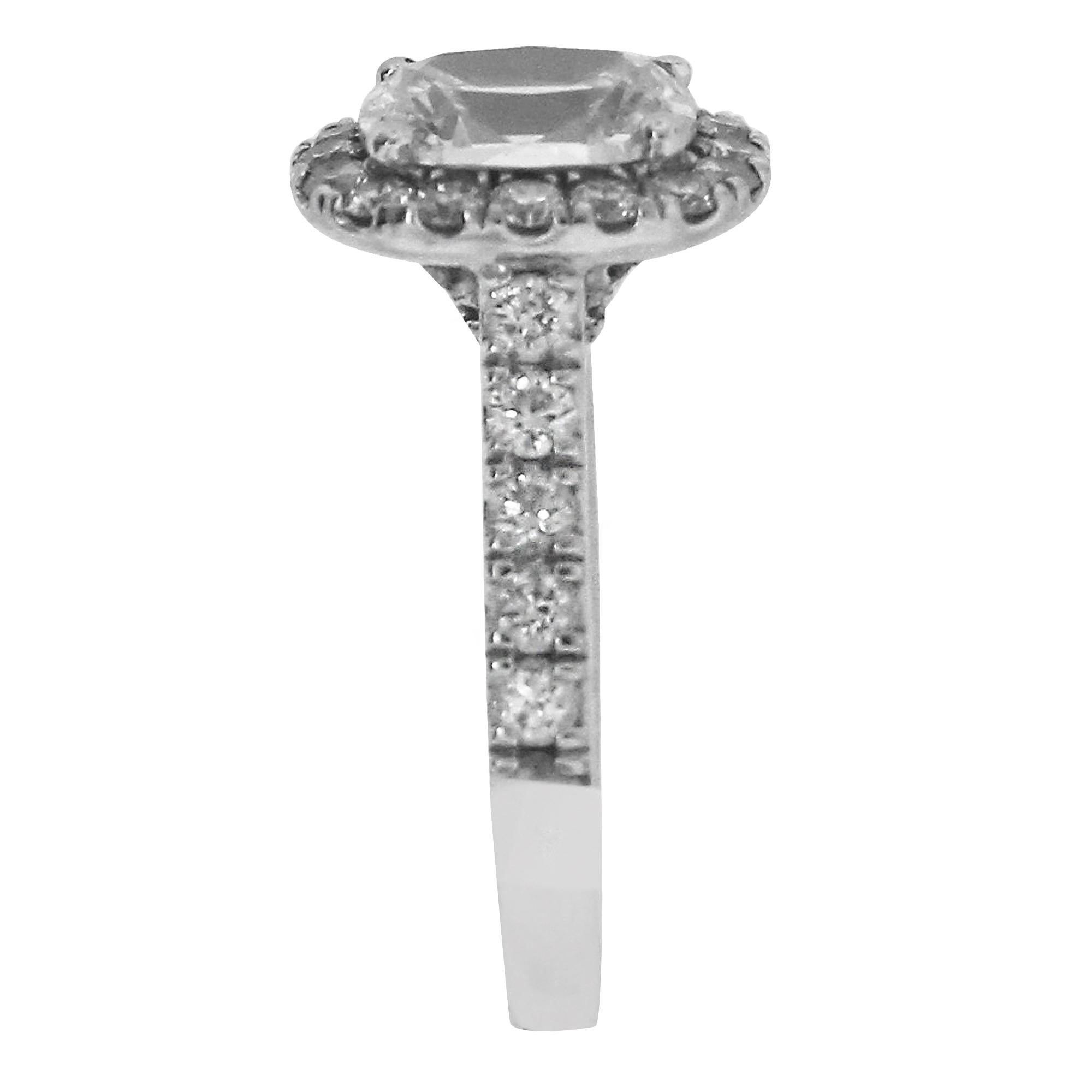 Material: 14k White Gold
Diamond Details: Approximately 1.37ctw cushion cut diamond. Center diamond is I in color and SI2 in clarity.
Accent Diamond Details: Approximately 0.91ctw round brilliant diamonds. Accent diamonds are G in color and SI1-SI2