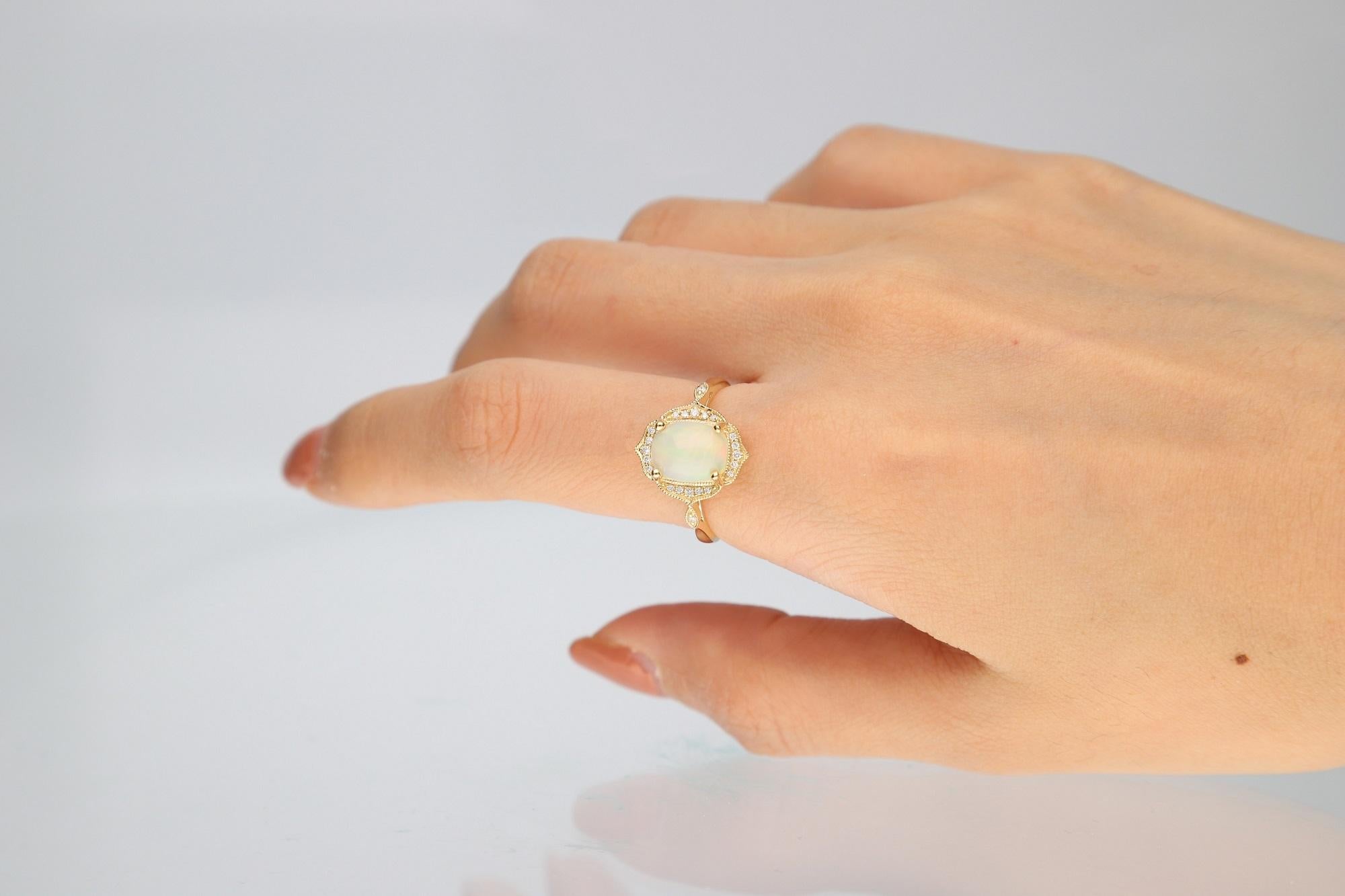 Stunning, timeless and classy eternity Unique ring. Decorate yourself in luxury with this Gin & Grace ring. This ring is made up of 9x7 MM Cushion-cut Prong Setting Ethiopian Opal (1pcs) 1.37 Carat and Round-Cut Prong Setting Diamond (22pcs) 0.09