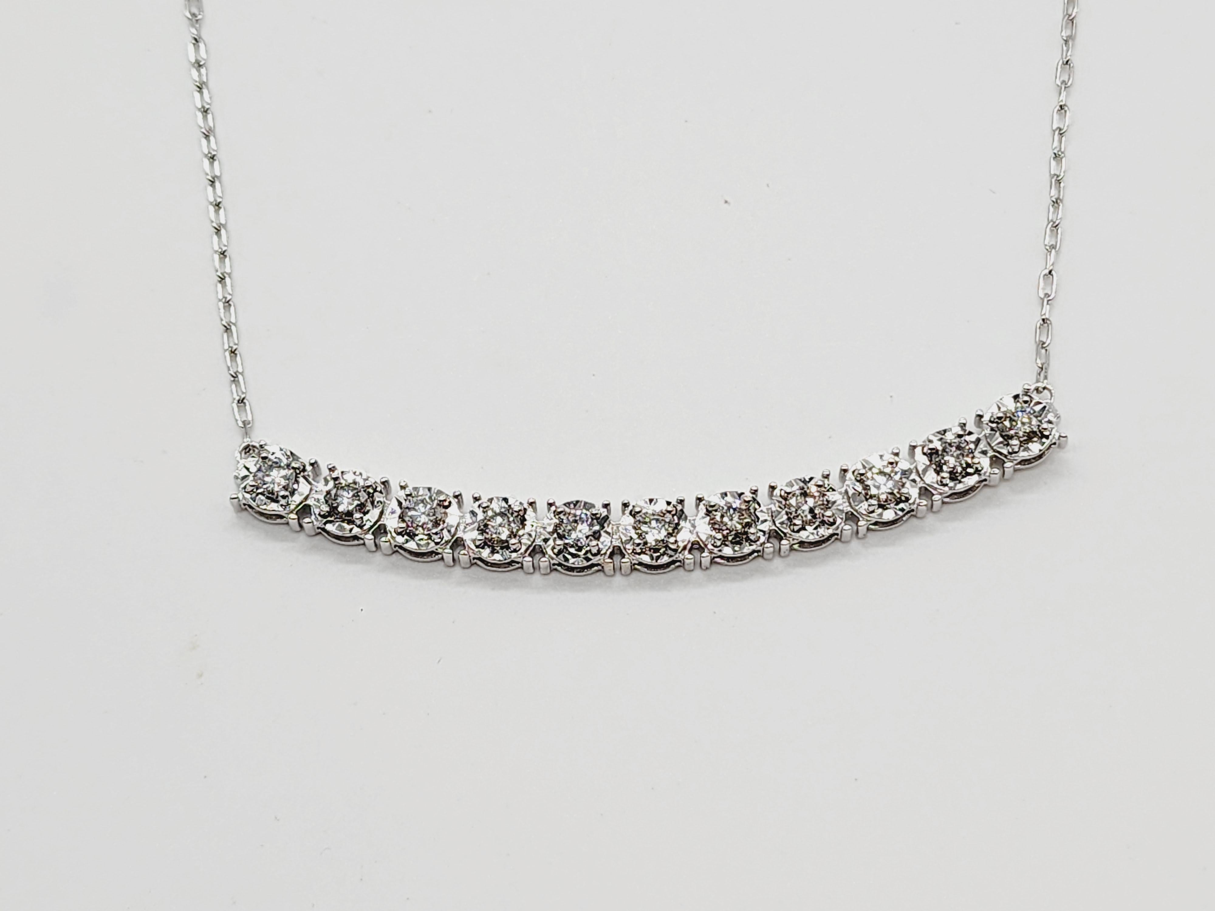 Brilliant and beautiful mini illusion setting necklace, natural round-brilliant cut white diamonds clean and Excellent shine. 14k White gold illusion setting four-prong for maximum light brilliance.
18 inch length. Average J Color, SI Clarity.