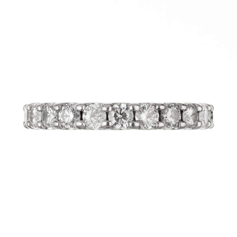 1.37 carat diamond eternity band in common prong platinum setting. 

22 round brilliant cut HI SI diamonds, Approximate 1.37 total carat weight
Size 5
Platinum
Stamped: PLAT
3.9 grams
Width at top: 2.8mm
Height at top: 2.4mm
Width at bottom: 2.8mm


