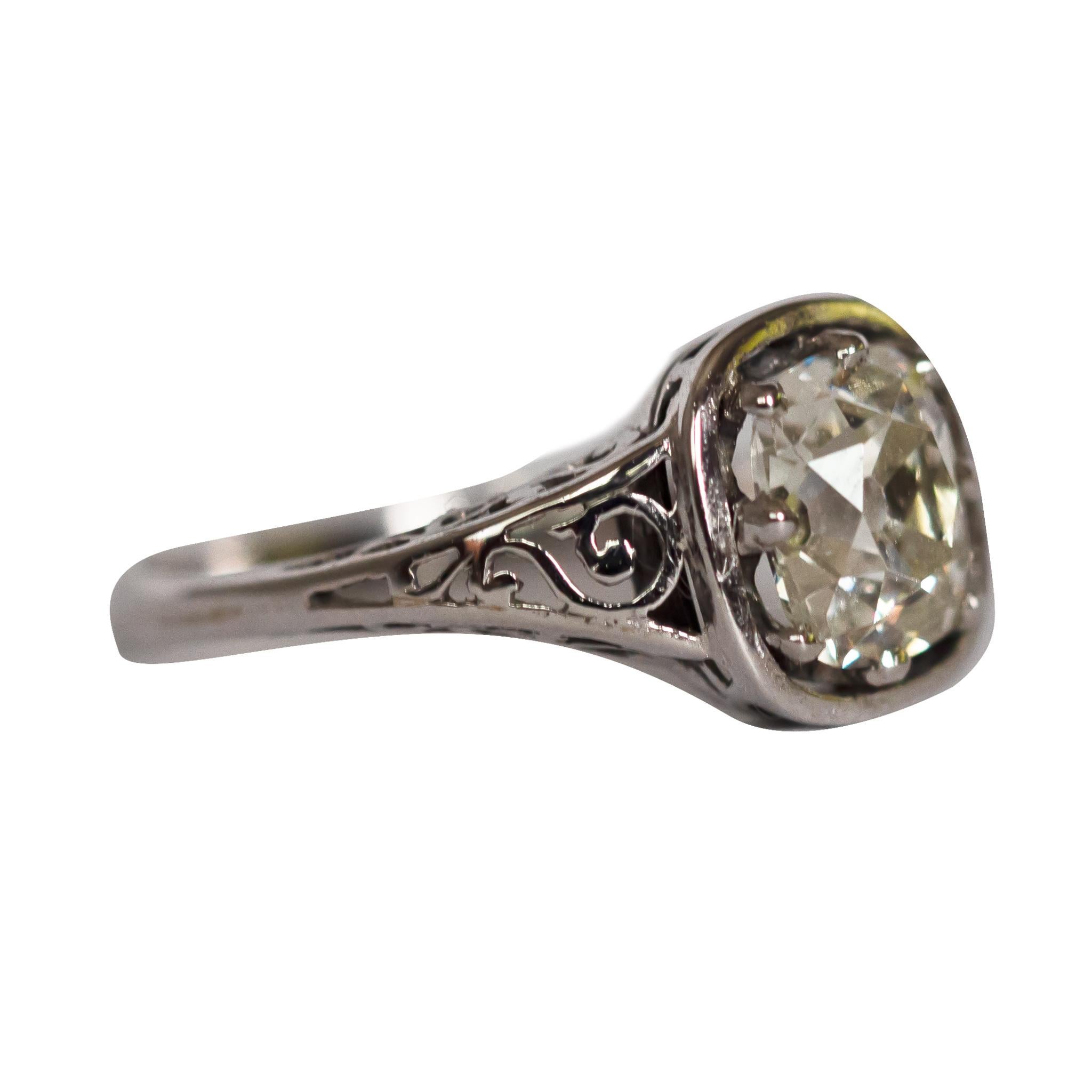 Ring Size: 7.75
Metal Type: 14k White Gold [Hallmarked, and Tested]
Weight:  2.5  grams

Center Diamond Details:
Weight: 1.37 carat
Cut: Old Mine / Antique Cushion 
Color: K-L
Clarity: VS1

Finger to Top of Stone Measurement: 6mm
Condition:  Very
