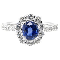 1.37 Carat Natural Blue Sapphire and Diamond Halo Ring Set in Platinum