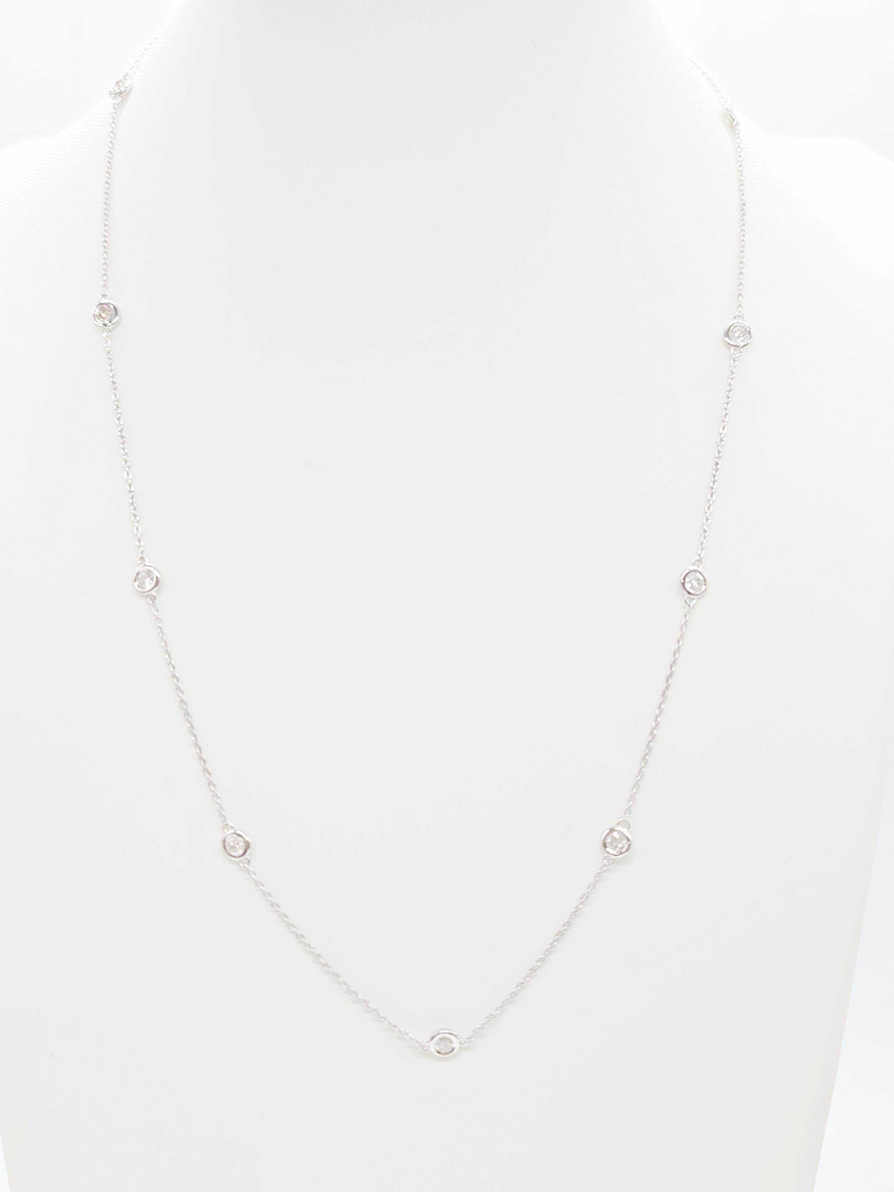 Collana con diamanti naturali - Oro bianco italiano 14K

Eleva la tua eleganza con questa raffinata collana Diamond by the Yard, meticolosamente realizzata in Italia in oro bianco massiccio 14 carati. Con 10 stazioni di diamanti scintillanti, questo
