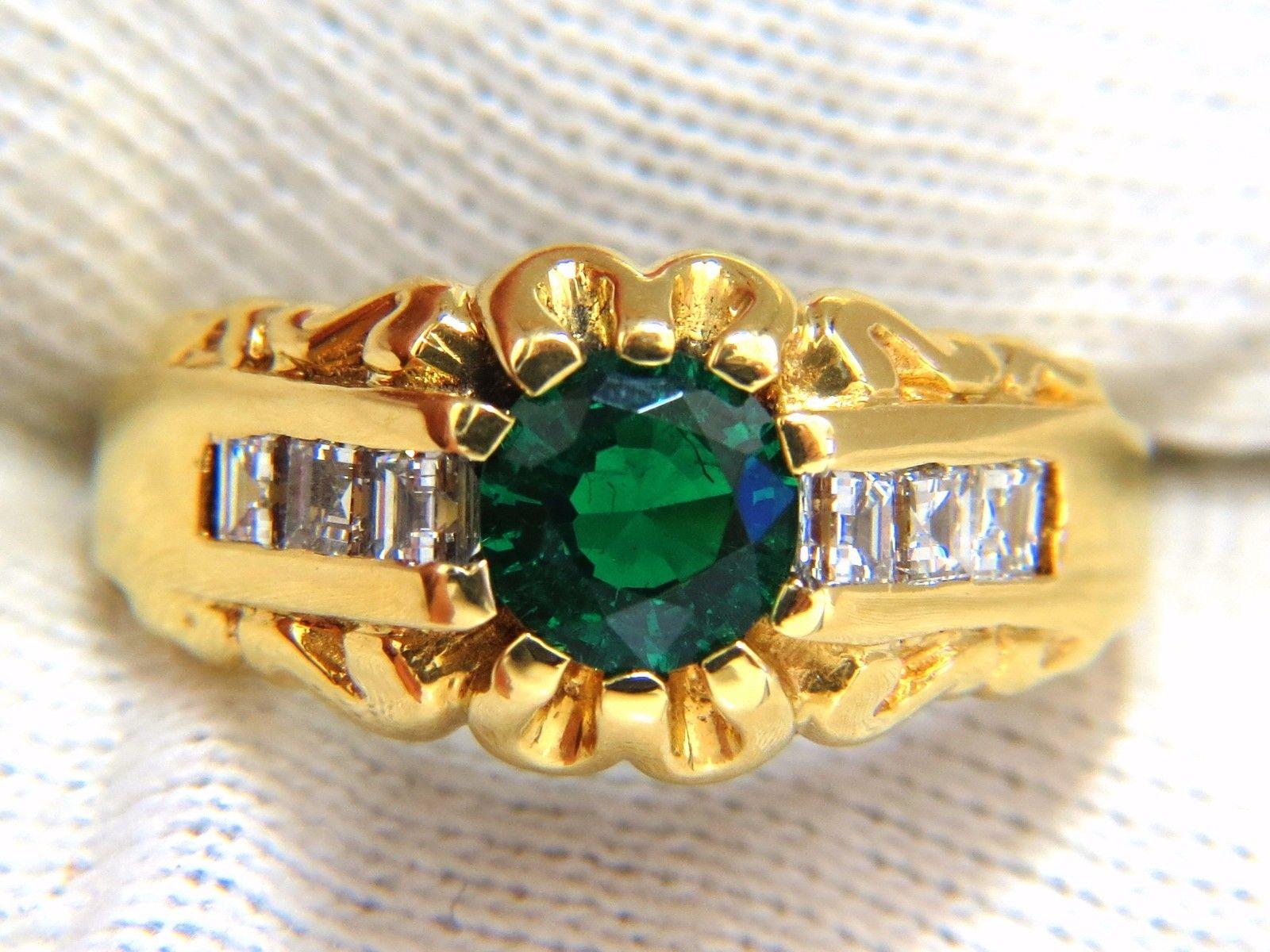Mens Emerald Pinky Addition

.77ct. natural round emerald ring

Full cut, Brilliant

Clean clarity & transparent.

AGI Certificate #DC14100201

Stating: Colombian Origin

6.22 - 6.25 X 3.69mm

Baguette Side diamonds:

.60ct.

G-color & Vs-2