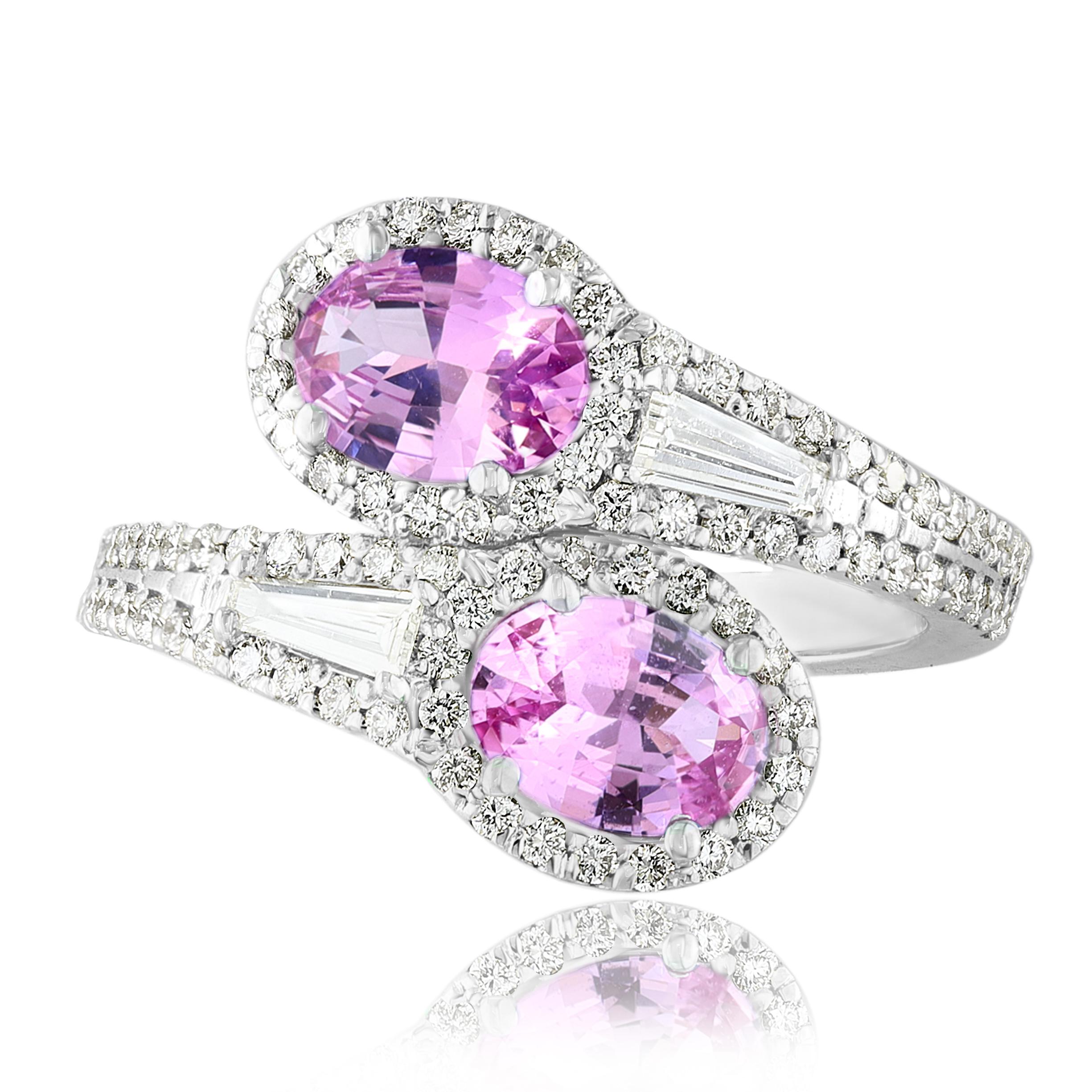 The stunning forever-together Toi et Moi ring features 2 Oval cut pink sapphire embraced by east to west 2 baguette diamonds weigh and 84 round diamonds halfway to the shank. Handcrafted in 14k White Gold.
2 oval Emeralds in the center weigh 1.37