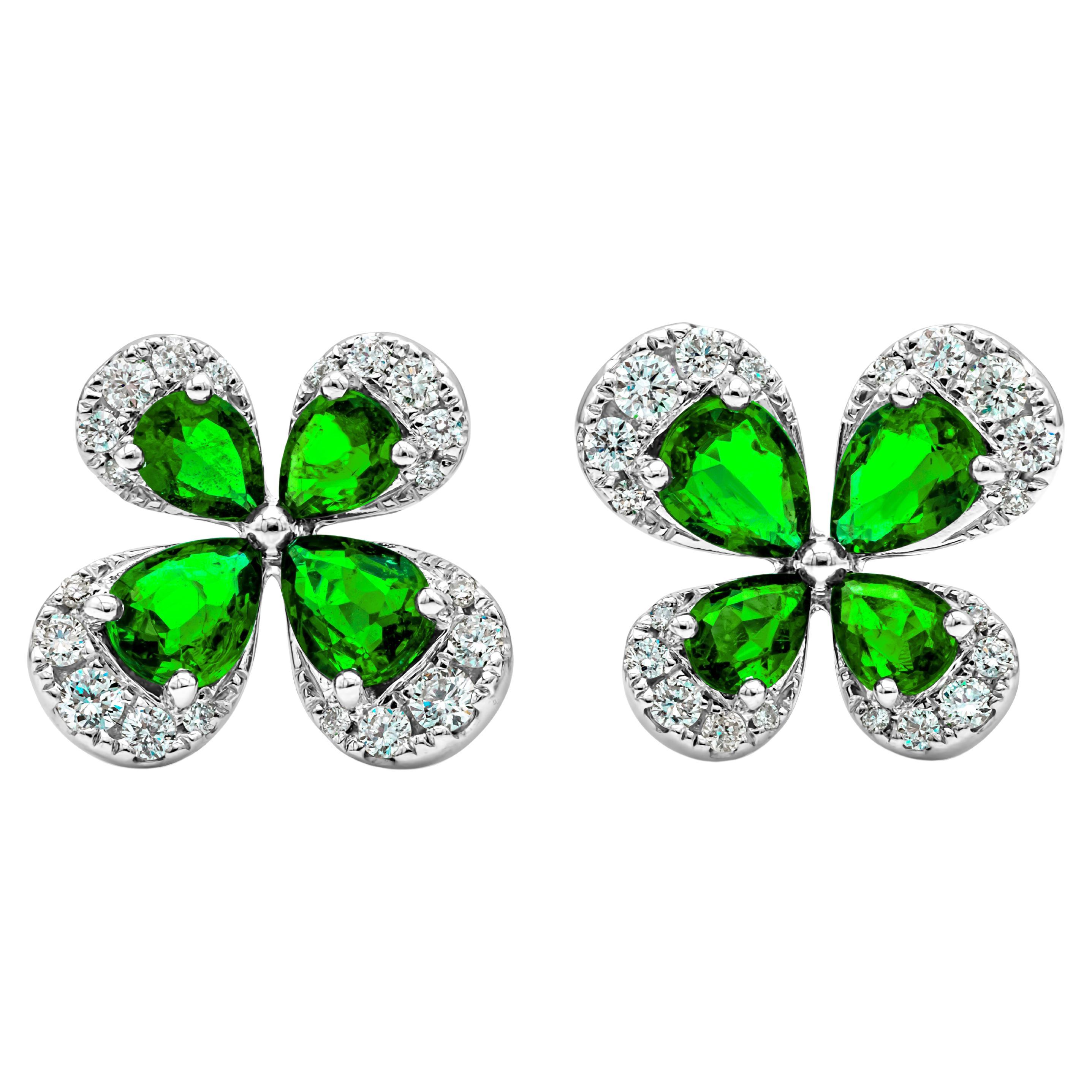 1.37 Carat Pear Shape Green Emerald and Diamonds Butterfly Shape Stud Earrings For Sale