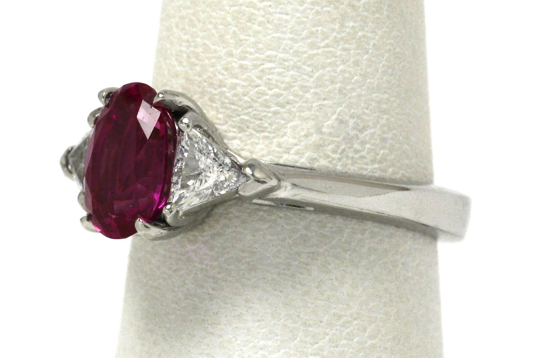 Oval Cut 1.37 Carat Pink Sapphire 3 Stone Engagement Ring For Sale