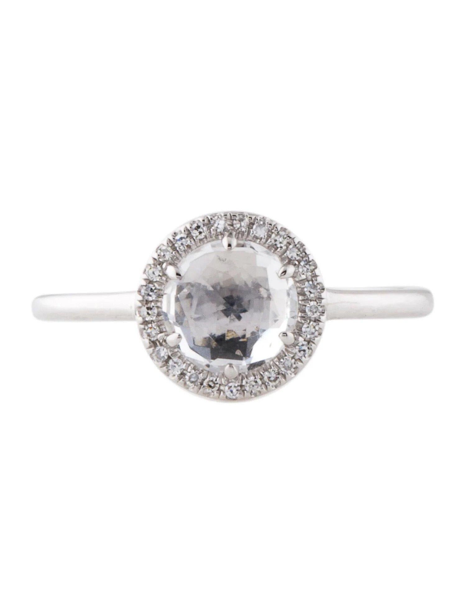 Dieser Ring aus weißem Topas und Diamanten ist ein atemberaubendes und zeitloses Accessoire, das jedem Outfit einen Hauch von Glamour und Raffinesse verleihen kann. 

Dieser Ring besteht aus einem runden weißen Topas von 1,37 Karat mit einem