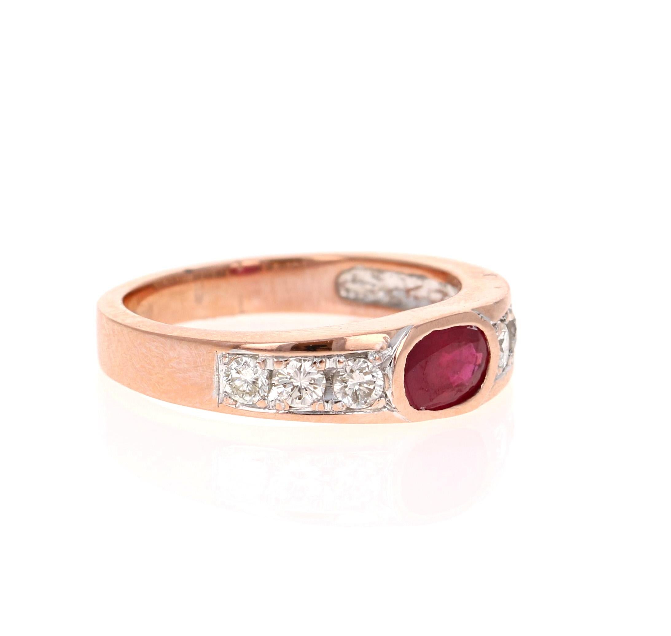 This unique band has 1 Oval Cut Ruby that weighs 1.00 Carats and 6 Round Cut Diamonds that weigh 0.37 Carats. 

The ring is casted in 18K Rose Gold and weighs approximately 6.2 grams. 

It is a size 7 and can be re-sized at no additional cost.