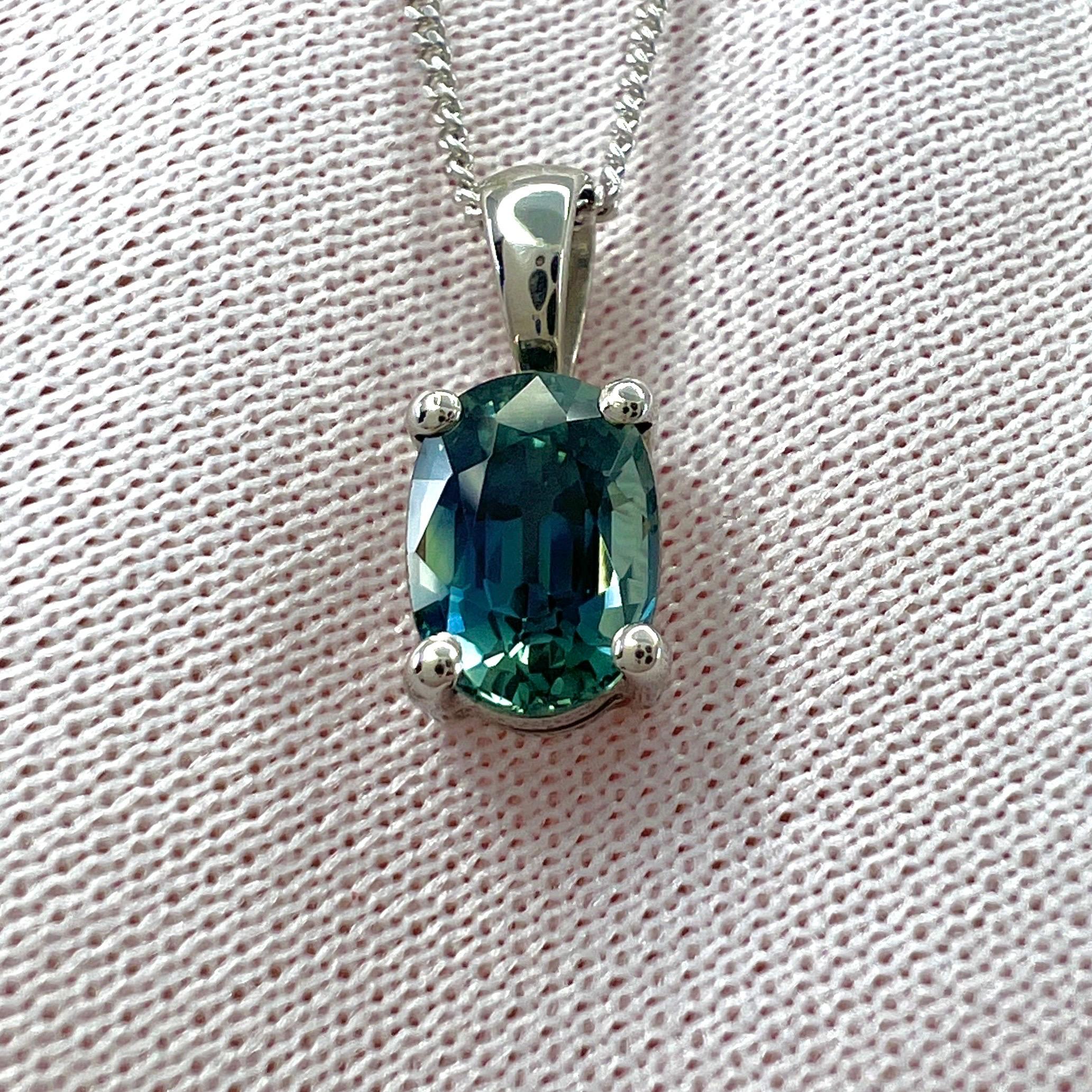 Natural Deep Teal Blue Green Sapphire Platinum Oval Cut Pendant Necklace.

1.37 Carat sapphire with a beautiful deep blue green 'teal' colour and excellent clarity, a very clean stone. VVS.

Also has an excellent oval cut, set in a fine 950 platinum