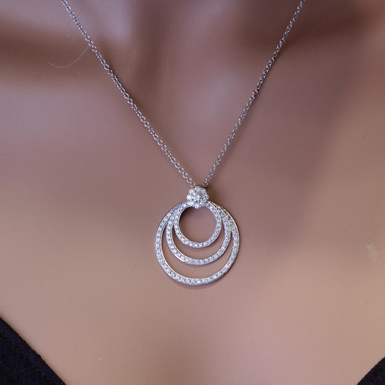 This beautiful pendant has three layers of circle framed diamonds, each freely able to dangle against the others. The total diamond weight is 1.37 carats. Set in 14k white gold.
Suggested retail price $10,026

DiamondTown is proud to offer a wide