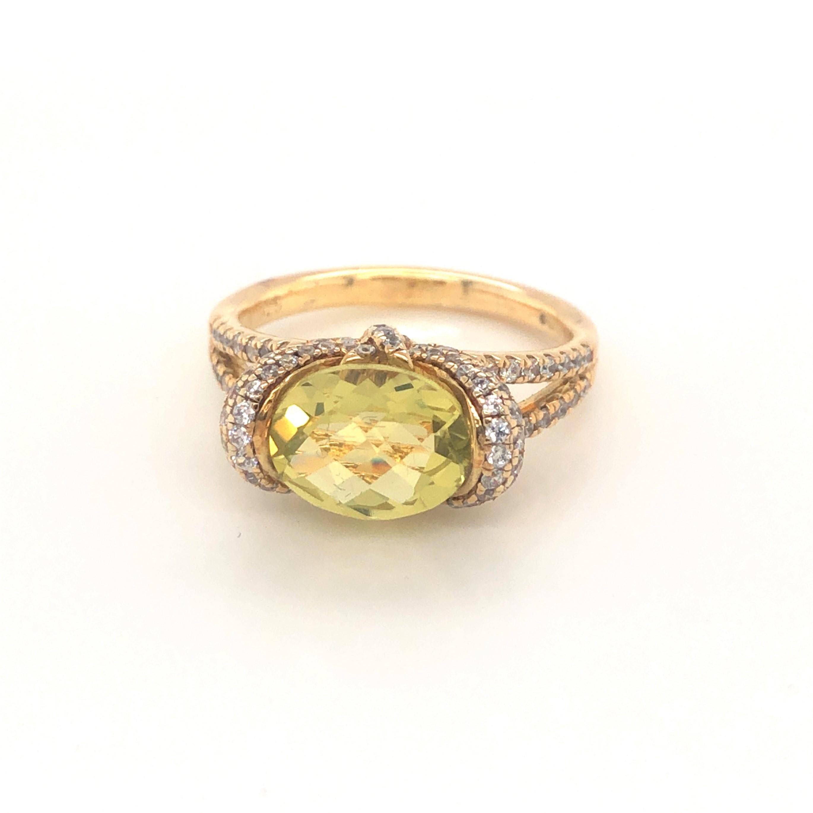 Exquisite golden hues radiate from this beautifully crafted piece.

Featuring an oval cushion cut lemon citrine weighing 1.37 carat, surrounded by 2.11 carat of round brilliant cut cubic zirconia, composed of 925 sterling silver with either a 14kt