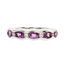 1.37 Carat Pink Sapphire and 0.14 Carat Diamonds 18 Karat Gold Wedding Band Ring