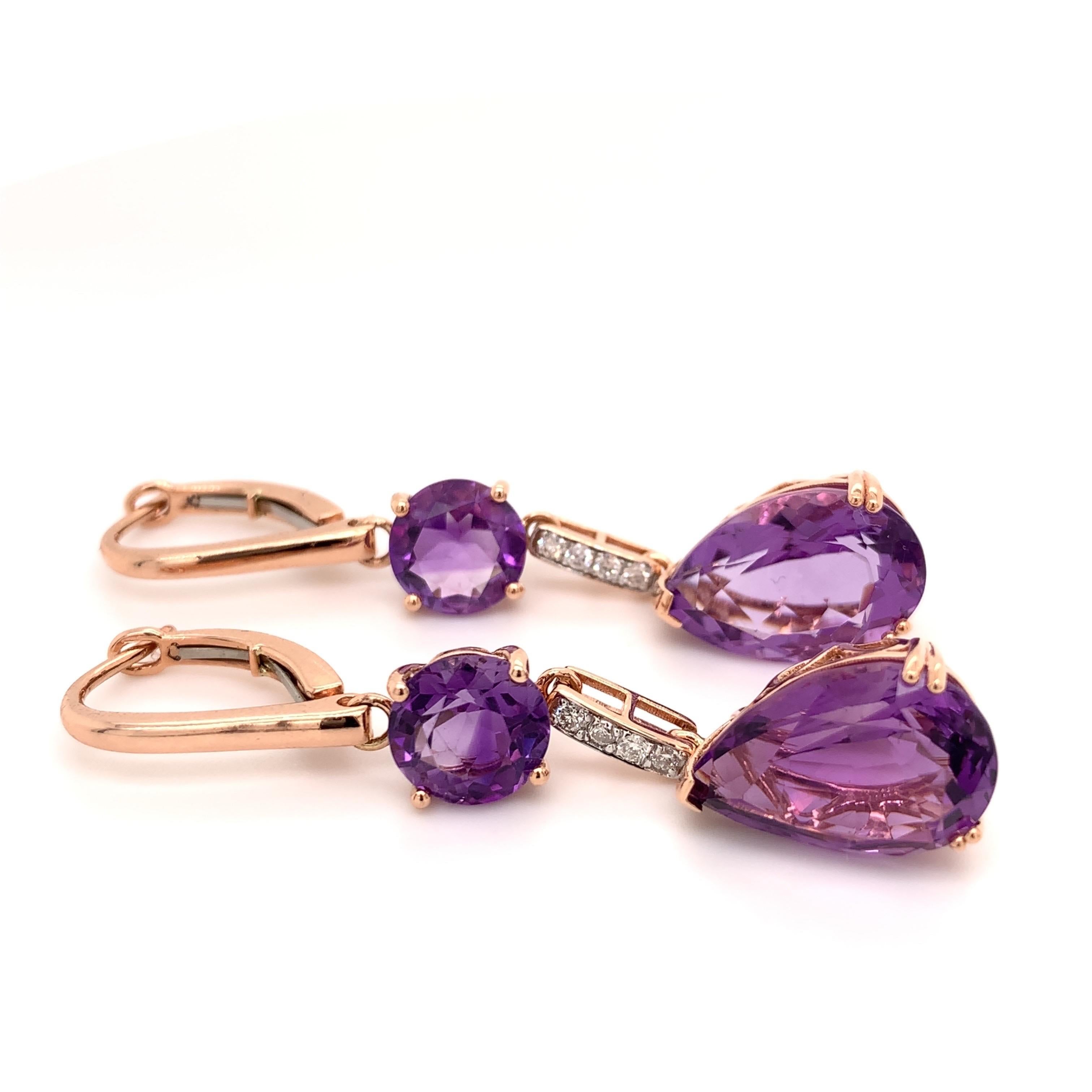 Stunning cocktail dangling amethyst earrings. High brilliance, lively purple tone, transparent clean, round faceted & pear faceted, natural 13.70 carats amethyst mounted with bead prong on high profile open basket, accented with a round brilliant