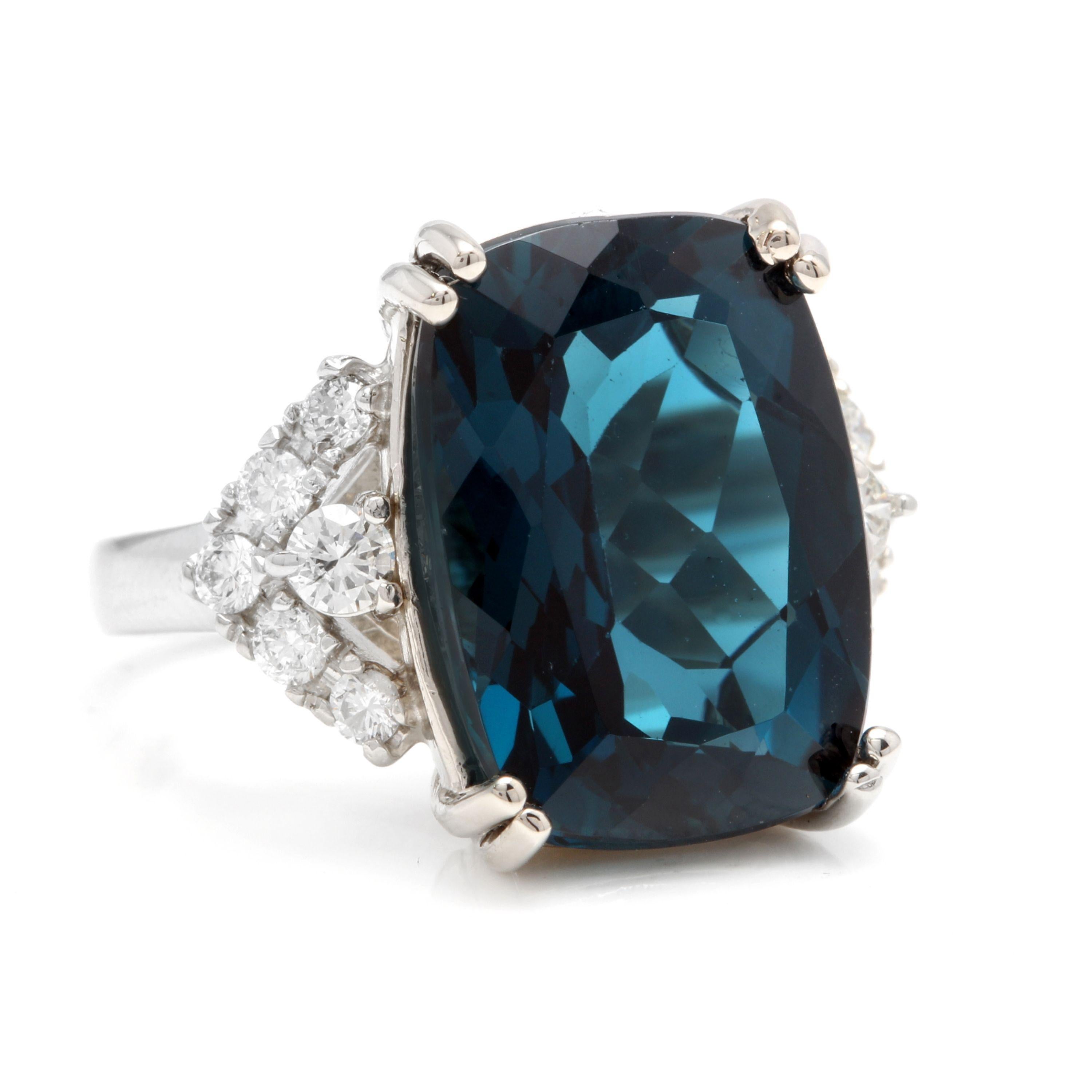 13.70 Carats Natural Impressive London Blue Topaz and Diamond 14K White Gold Ring

Total Natural London Blue Topaz Weight: Approx. 13.00 Carats

London Blue Topaz Measures: Approx. 16 x 12mm

Natural Round Diamonds Weight: Approx. 0.70 Carats (color