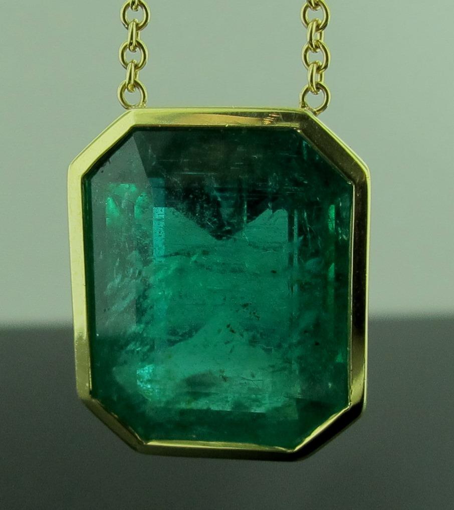 Emerald Cut 13.71 Carat Emerald Pendant in 18 Karat Yellow Gold For Sale