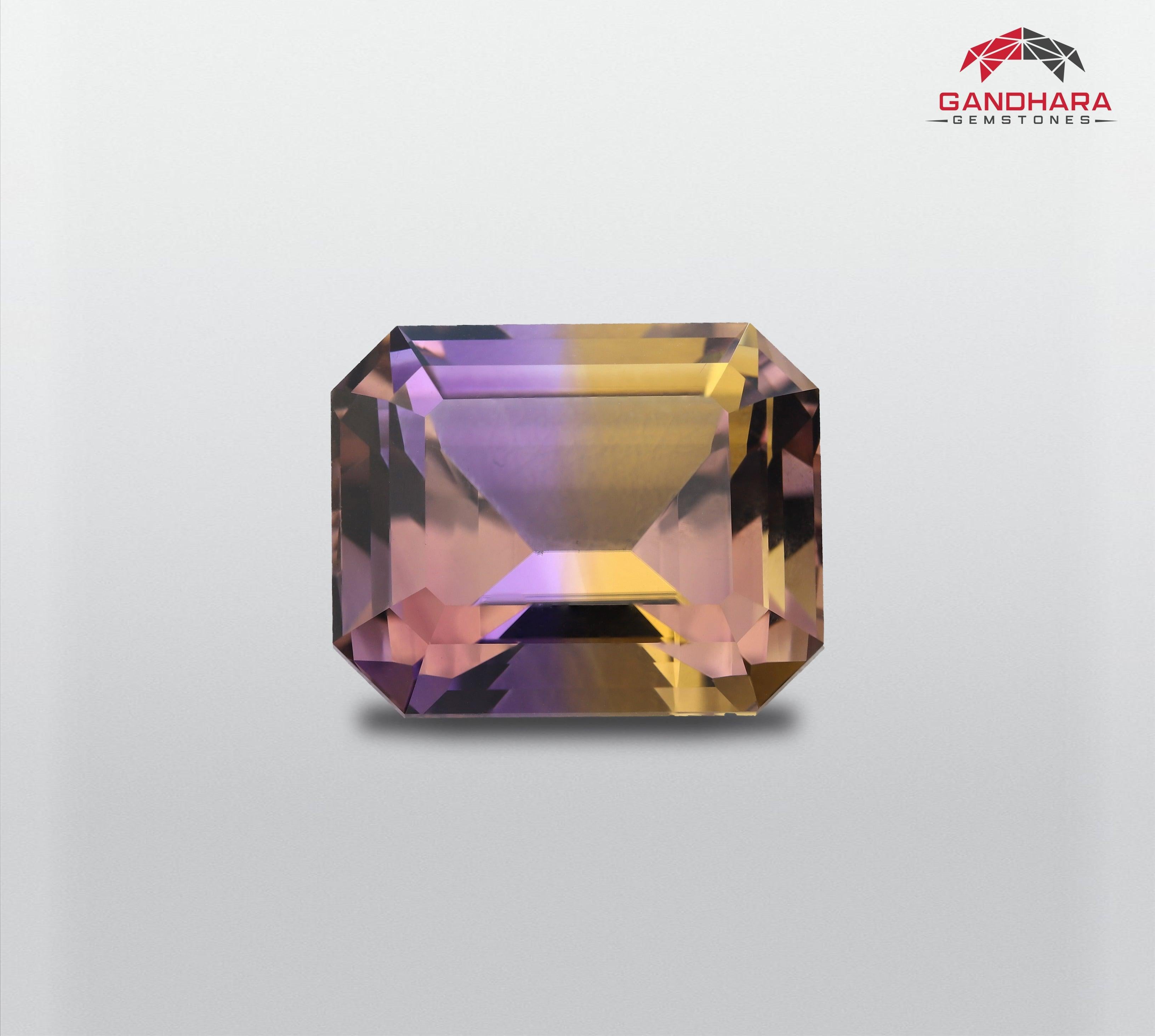 Natural Pretty Ametrine Gemstone, Available For Sale At Wholesale Price, Natural High-Quality, Loupe Clean, Emerald-Cut, Loose Certified Ametrine Gemstone From Bolivia.

Product Information :
Weight: 13.72 carats
Dimensions: 15.7 x 12.7 x 9.9
