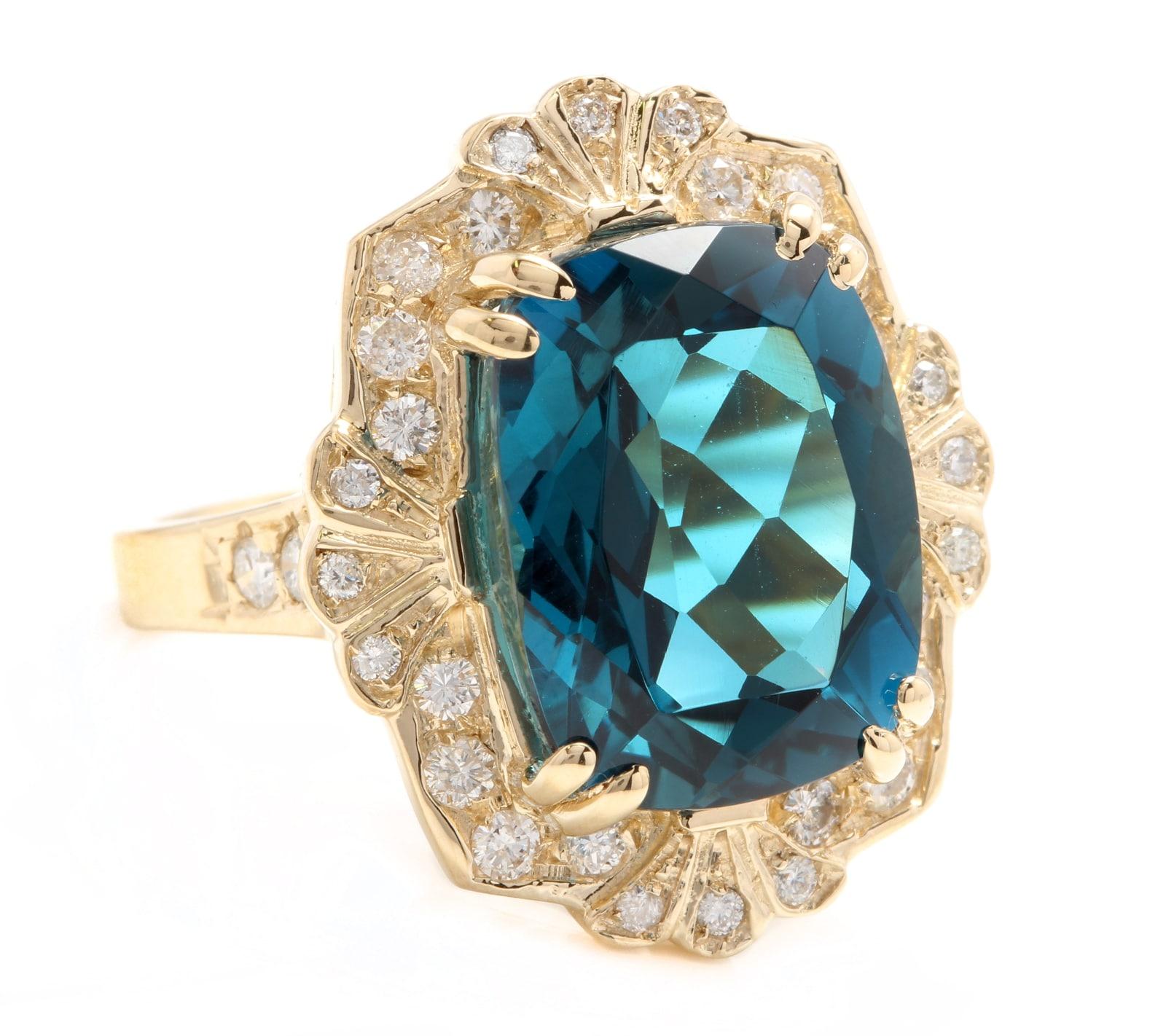 13.75 Carats Natural Impressive London Blue Topaz and Diamond 14K Yellow Gold Ring

Total Natural London Blue Topaz Weight: Approx. 13.00 Carats

London Blue Topaz Measures: 16 x 12mm

Natural Round Diamonds Weight: 0.75 Carats (color G-H / Clarity
