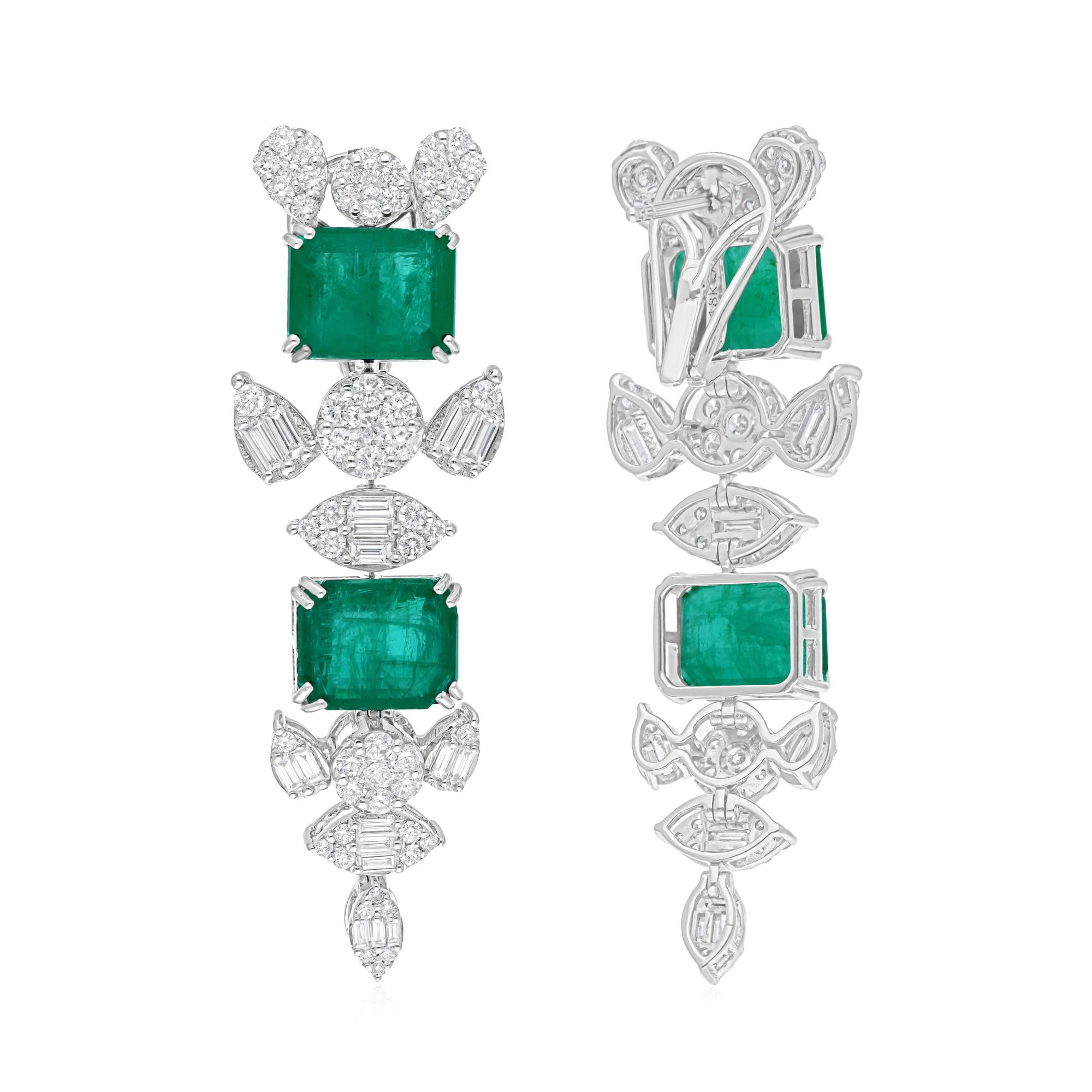 Cast from 18-karat gold, these exquisite earrings are handset with 13.75 carats Zambian emerald and 3.70 carats of sparkling diamonds.

FOLLOW SPECTRUM JEWELS storefront to view the latest collection & exclusive pieces. Spectrum Jewels is proudly