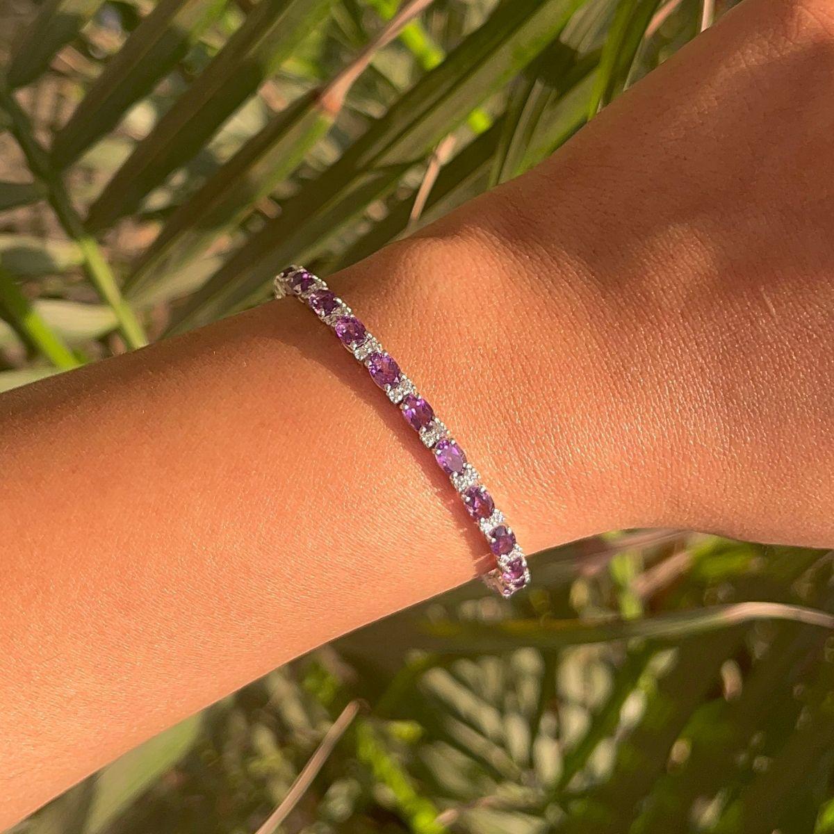 13.75 Carats Amethyst Tennis Bracelet in 925 Sterling Silver. You shall need statement tennis bracelet to make a statement with your look. Each piece features dazzling cubic zirconia stones, renowned for their brilliance and clarity, set in